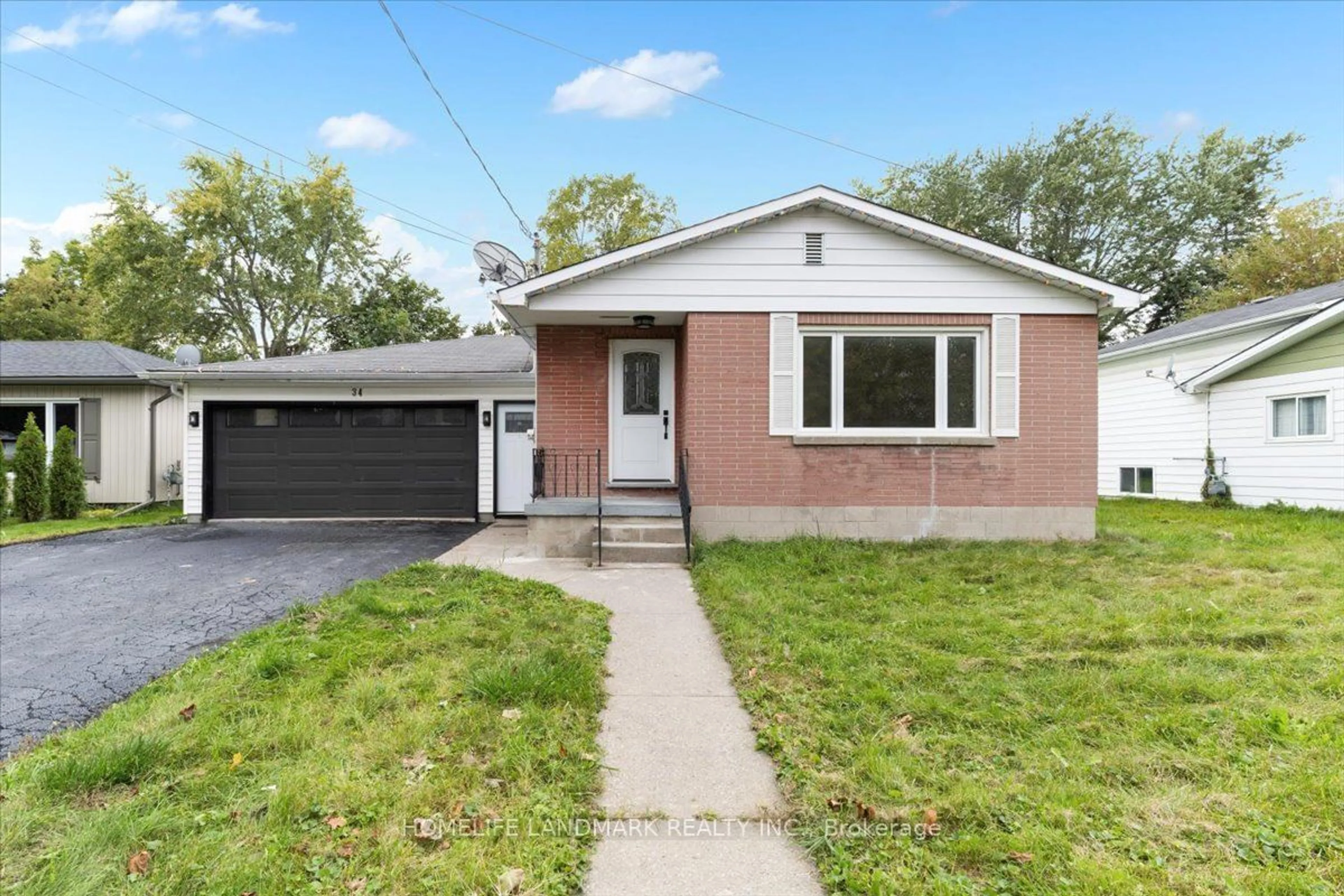 Home with brick exterior material, street for 34 Division St, Brighton Ontario K0K 1H0
