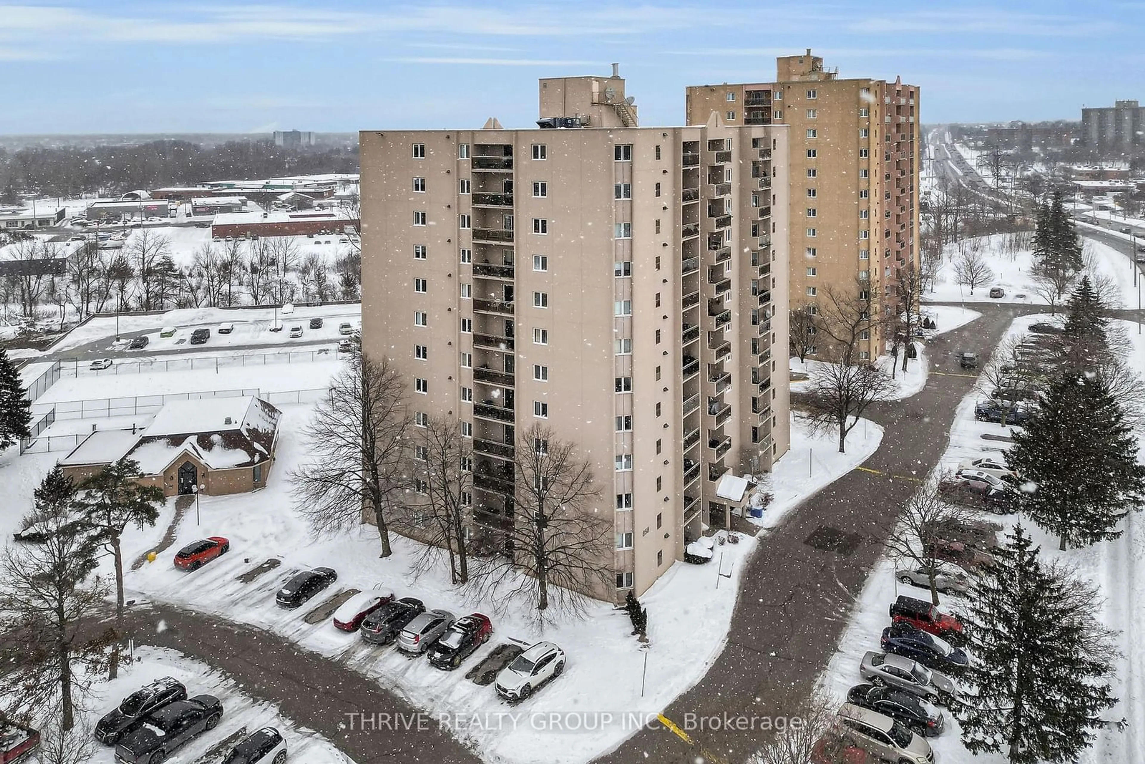 A pic from outside/outdoor area/front of a property/back of a property/a pic from drone, city buildings view from balcony for 858 Commissioners Rd #1006, London Ontario N6C 5Y5