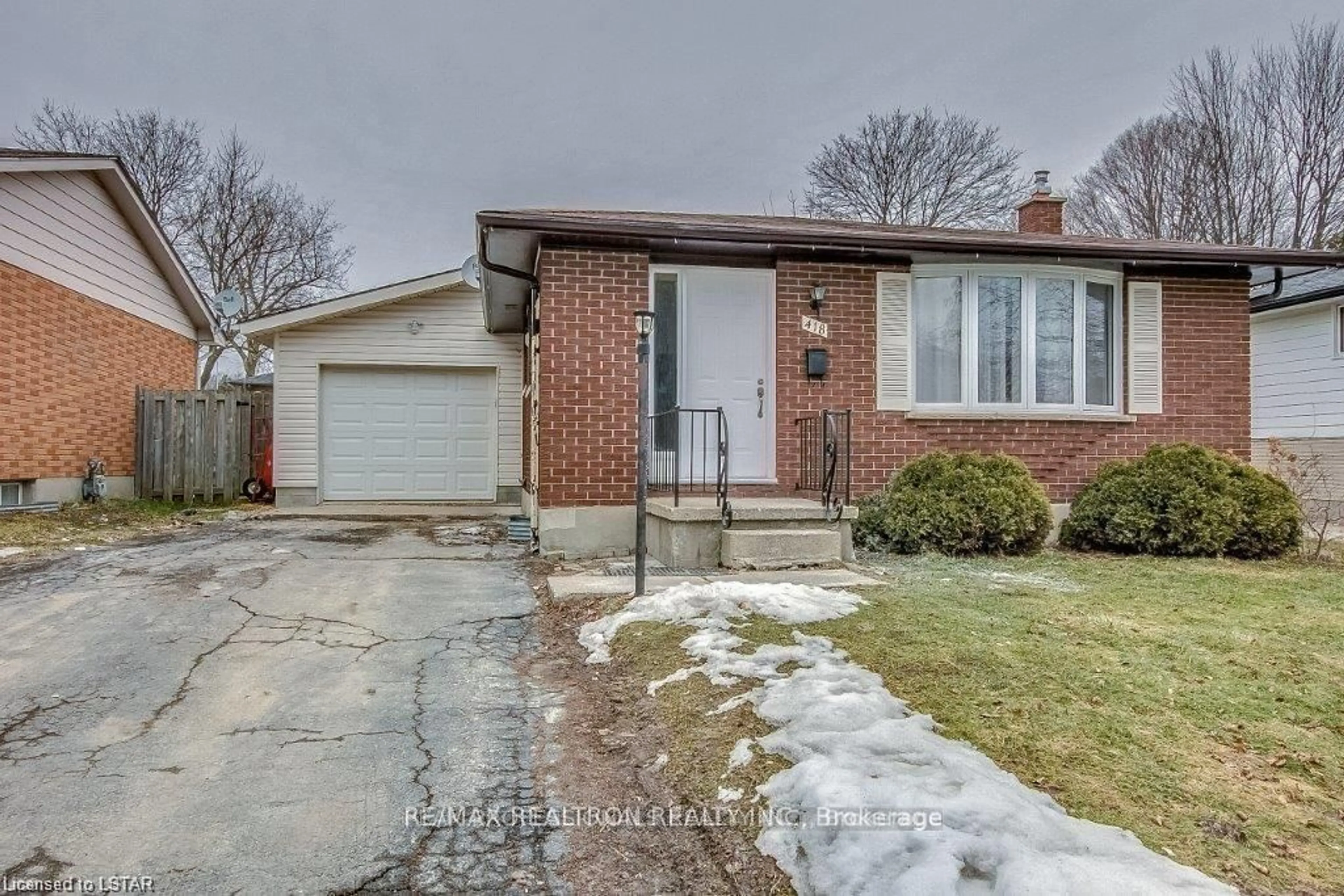 Home with brick exterior material, street for 418 Castlegrove Blvd, London Ontario N6G 1K6