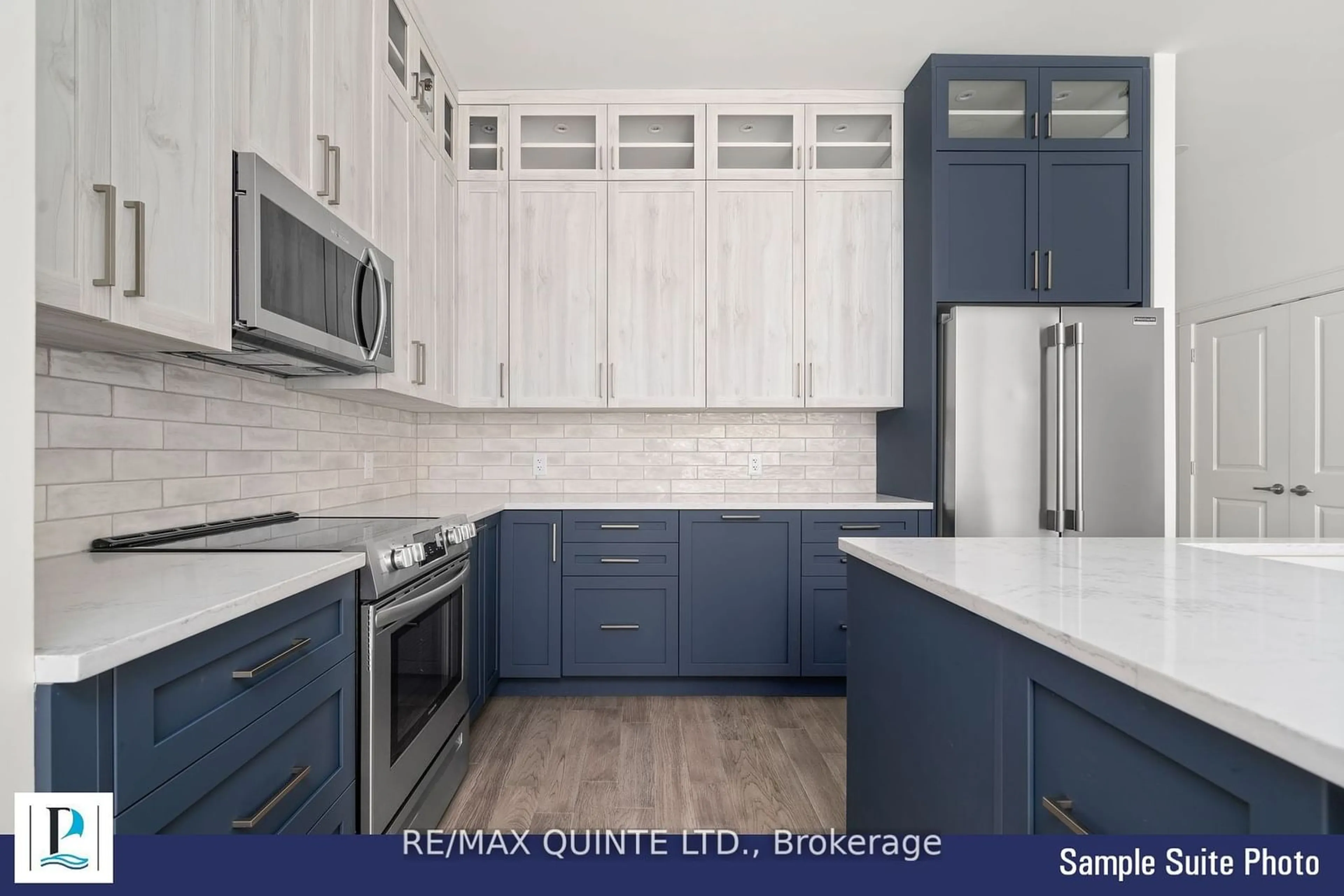 Open concept kitchen, ceramic/tile floor for 17 Cleave Ave #405, Prince Edward County Ontario K0K 2T0