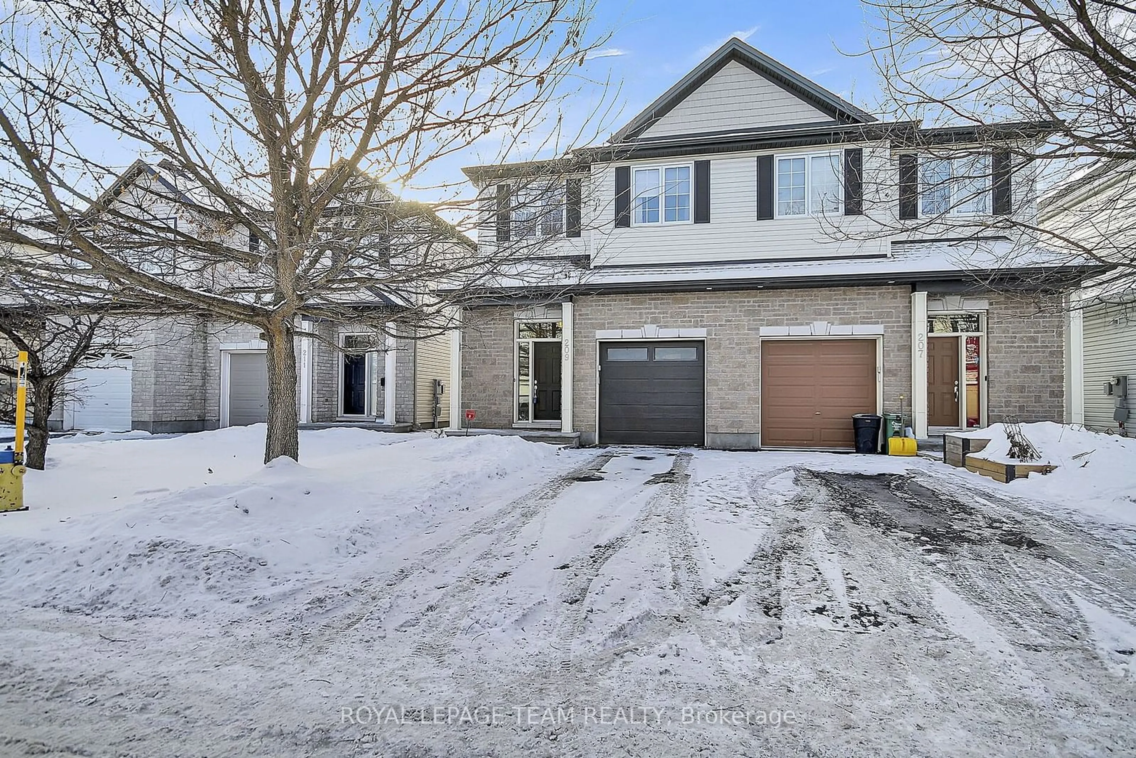 A pic from outside/outdoor area/front of a property/back of a property/a pic from drone, street for 209 Harthill Way, Barrhaven Ontario K2J 0P1