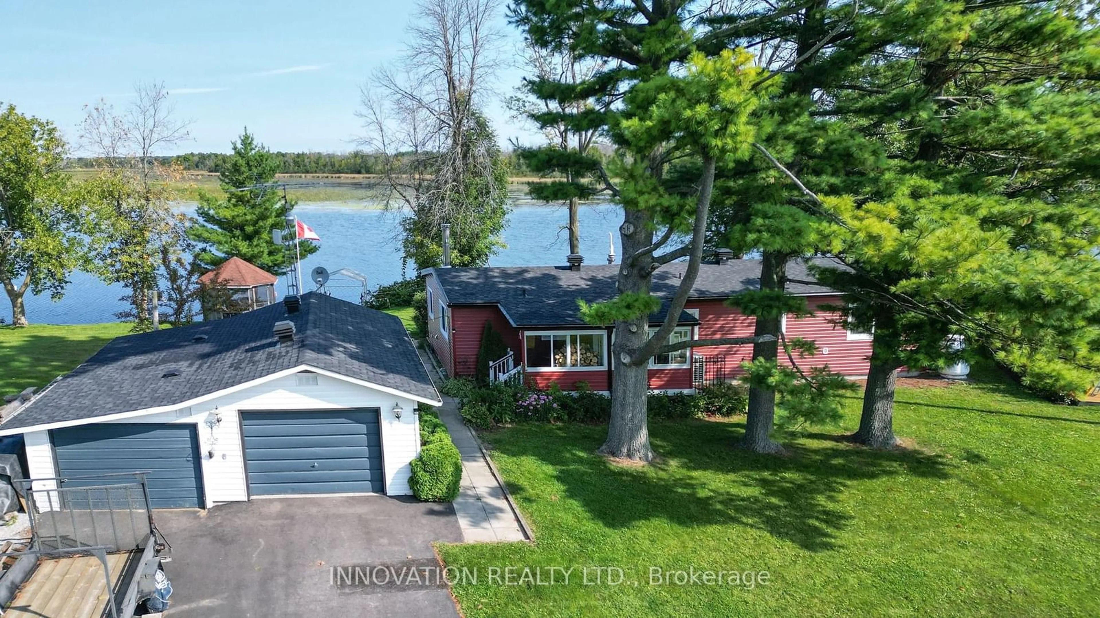 A pic from outside/outdoor area/front of a property/back of a property/a pic from drone, water/lake/river/ocean view for 134 Ogilvie Lane, Merrickville-Wolford Ontario K0G 1G0