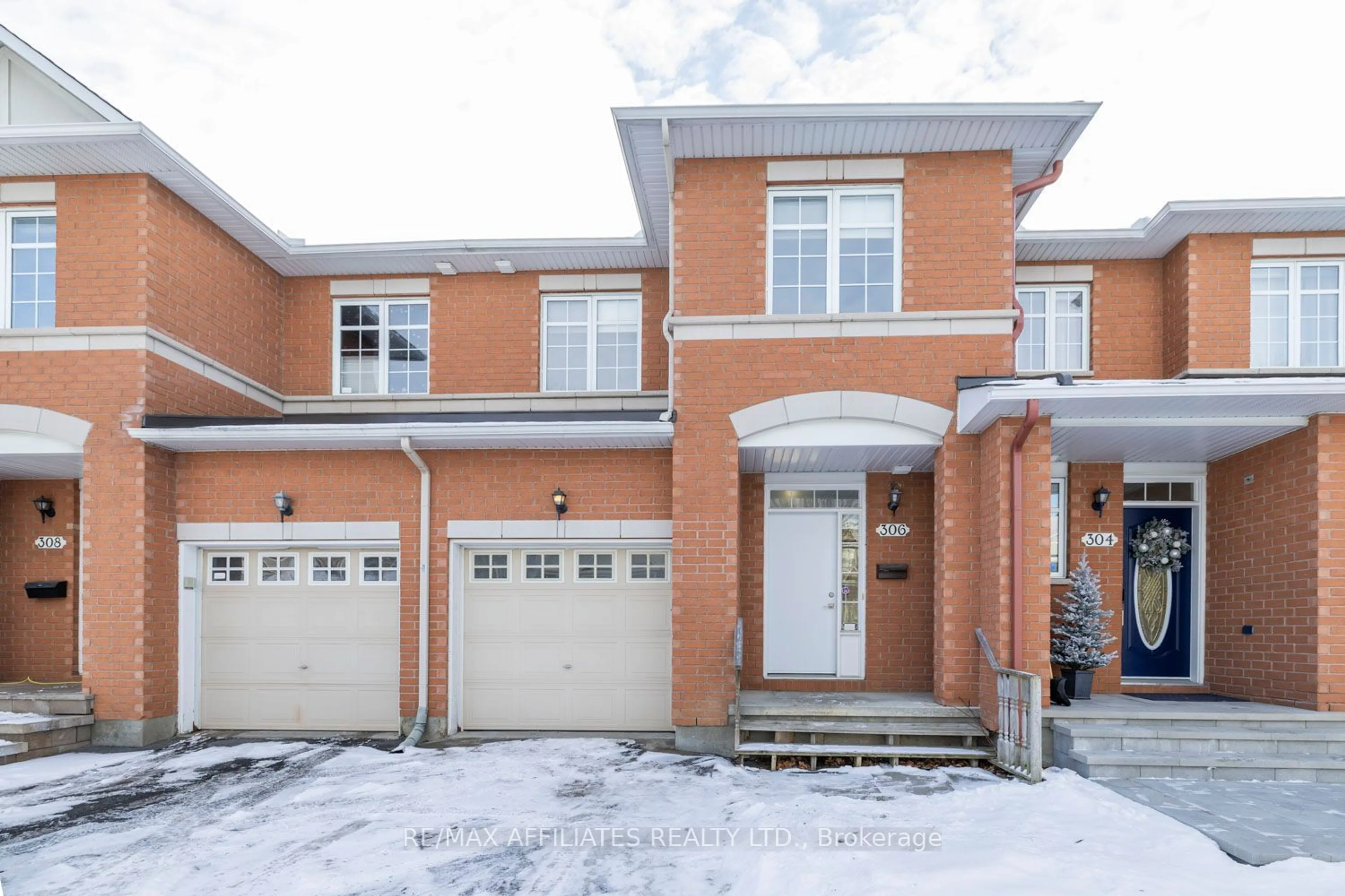 Home with brick exterior material, street for 306 Berrigan Dr, Barrhaven Ontario K2J 5B5