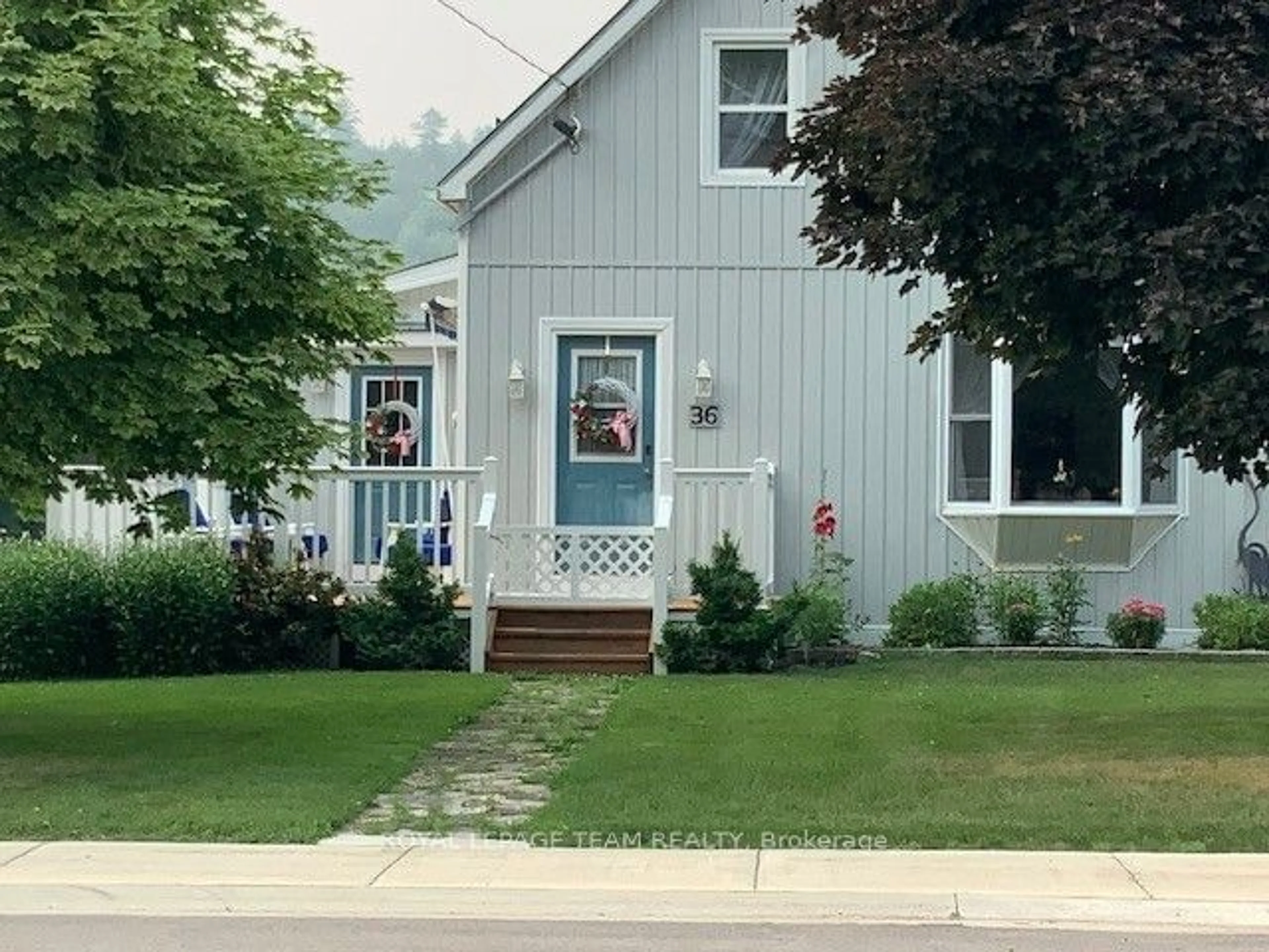 Home with vinyl exterior material, street for 36 Bedford St, Westport Ontario K0G 1X0