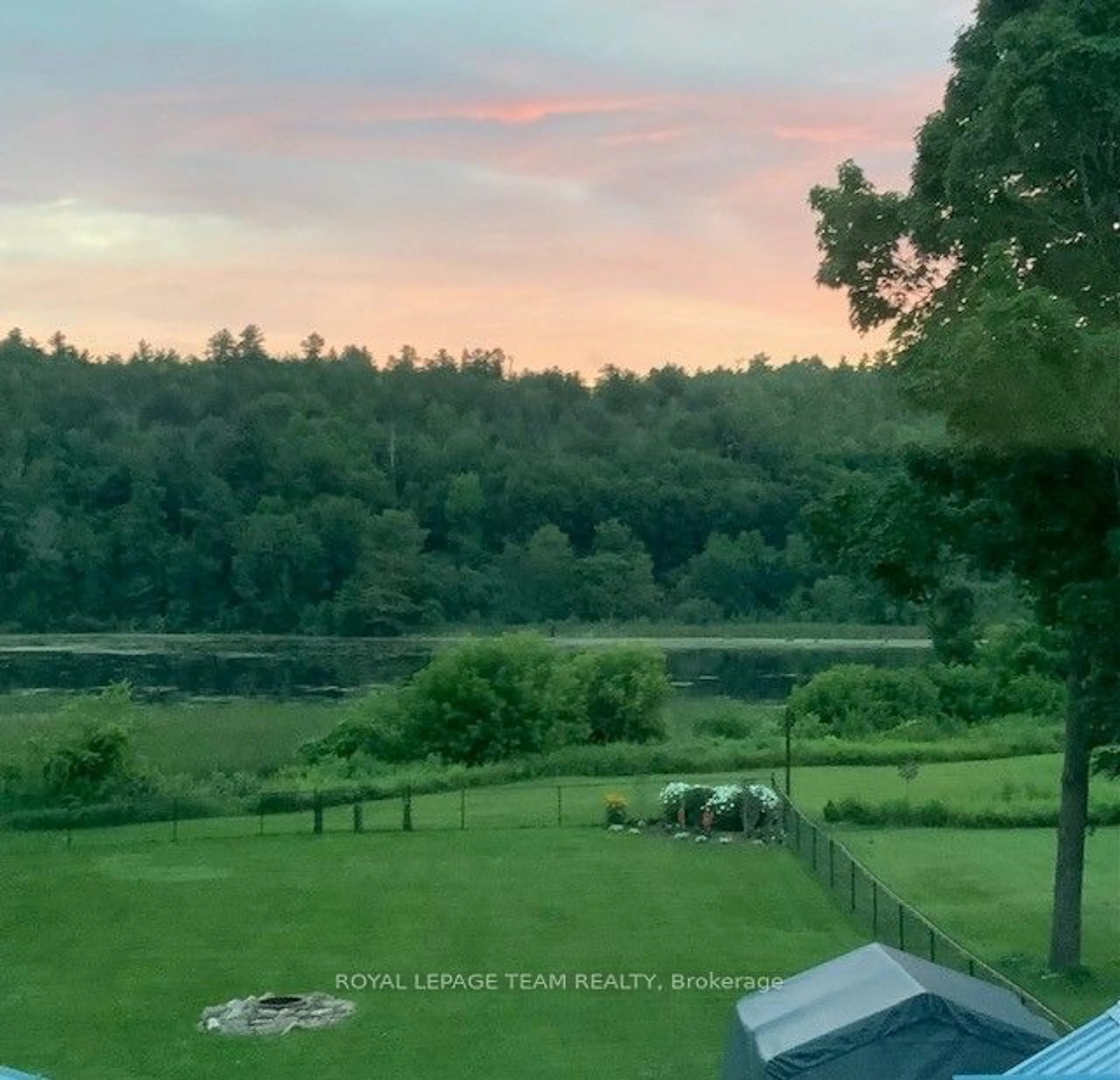 A pic from outside/outdoor area/front of a property/back of a property/a pic from drone, water/lake/river/ocean view for 36 Bedford St, Westport Ontario K0G 1X0