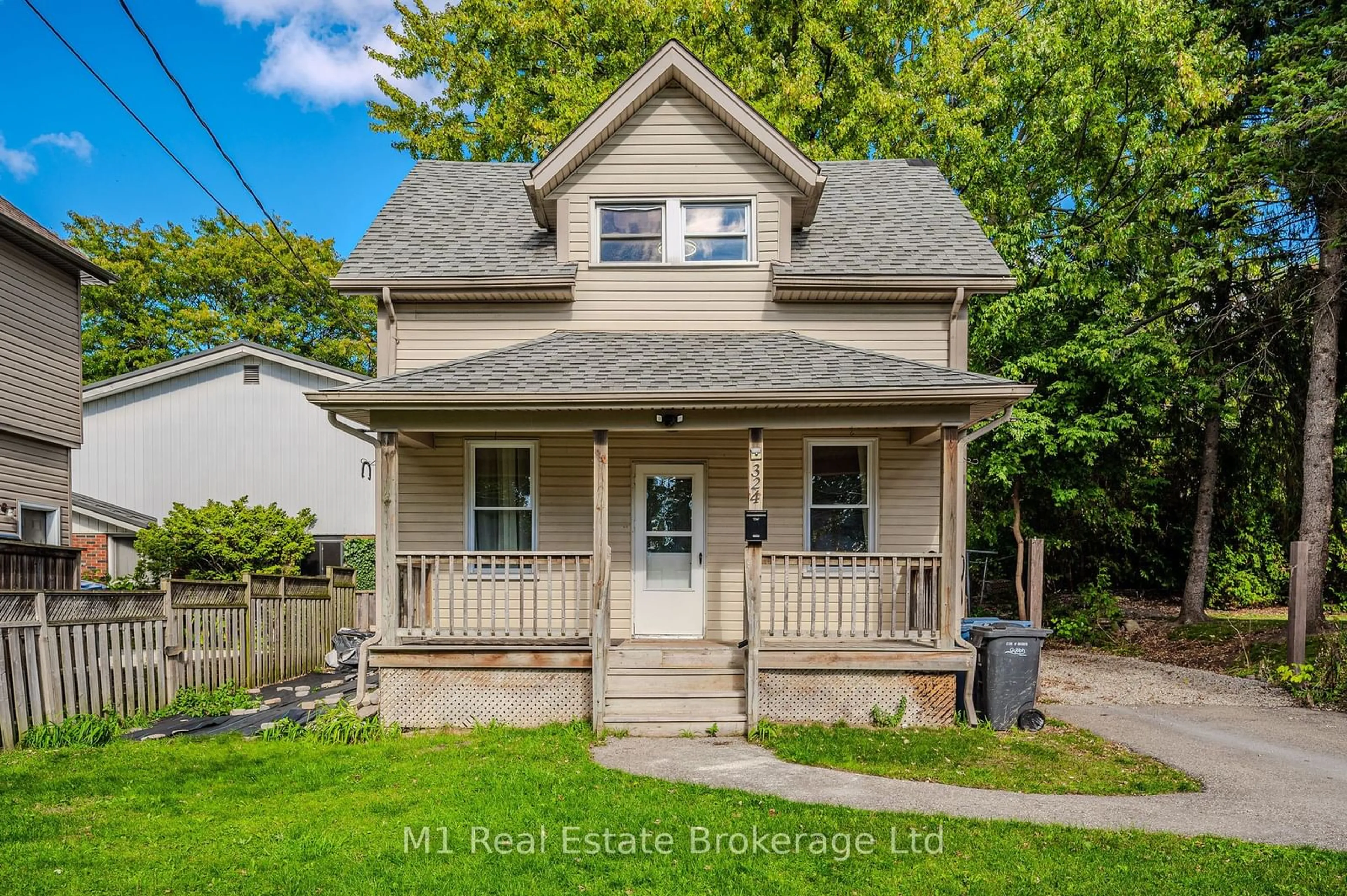 Home with vinyl exterior material, street for 324 EDINBURGH Rd, Guelph Ontario N1G 2K5