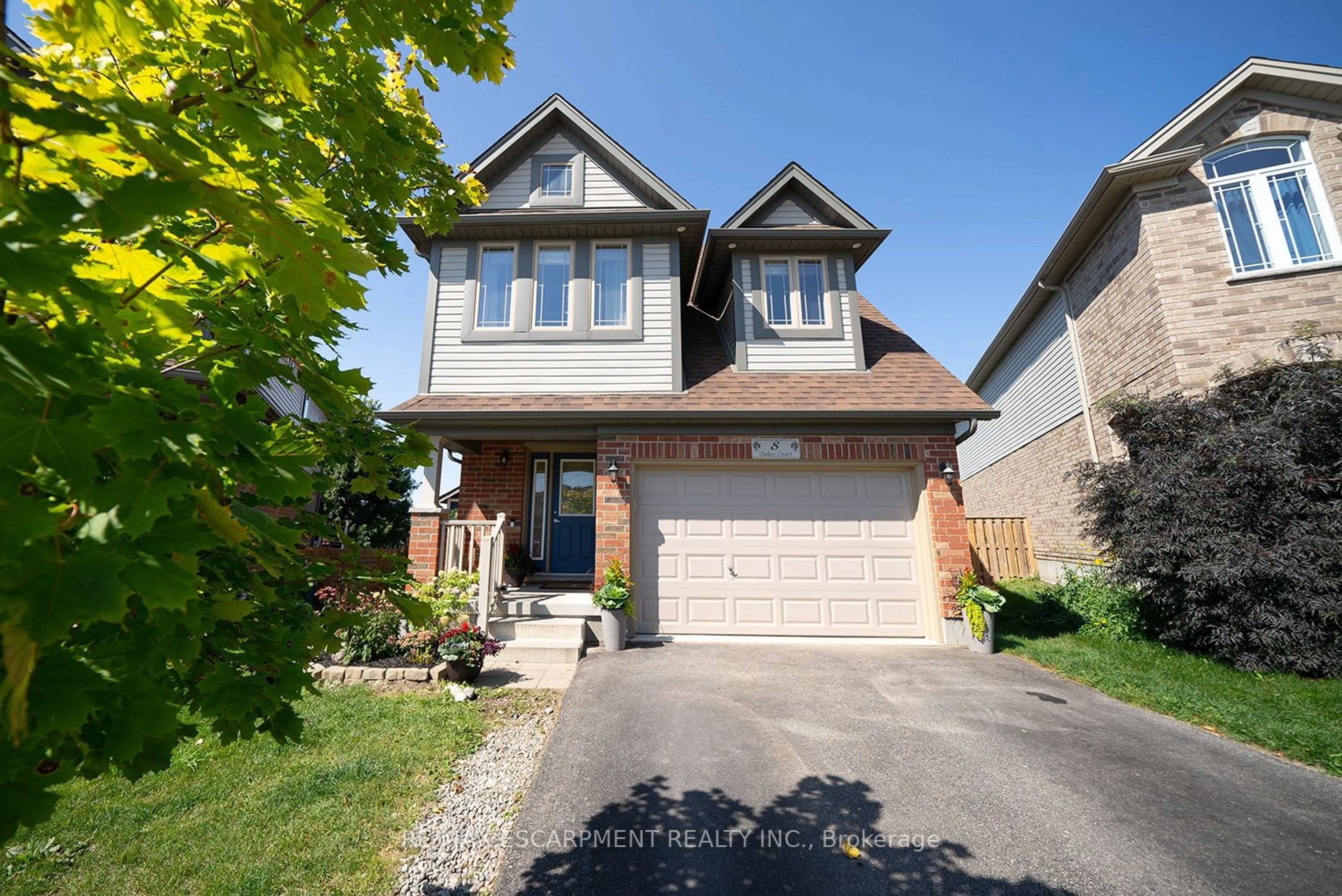 Home with brick exterior material, street for 8 Oakes Crt, Guelph Ontario N1E 0J6