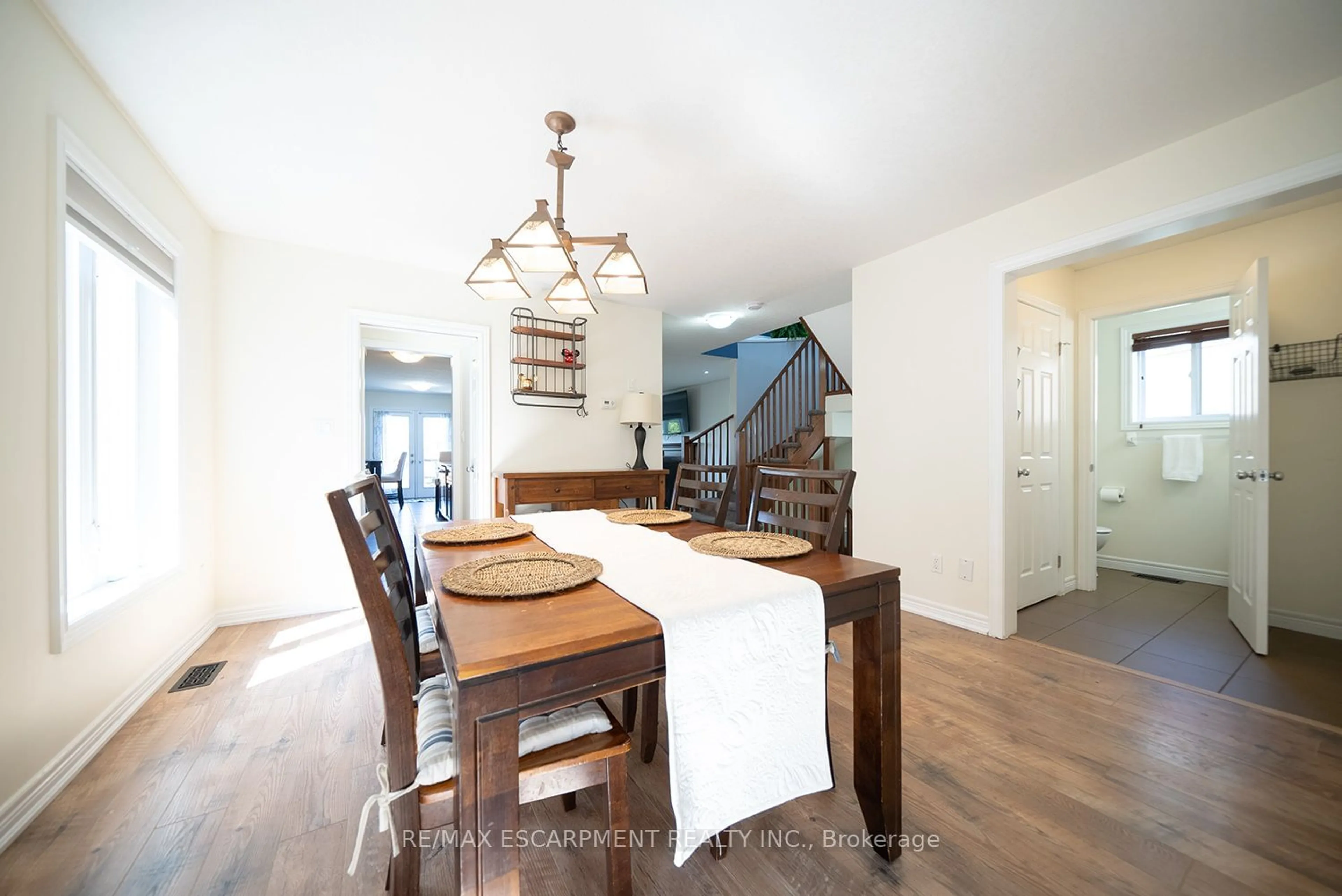 Dining room, wood/laminate floor for 8 Oakes Crt, Guelph Ontario N1E 0J6