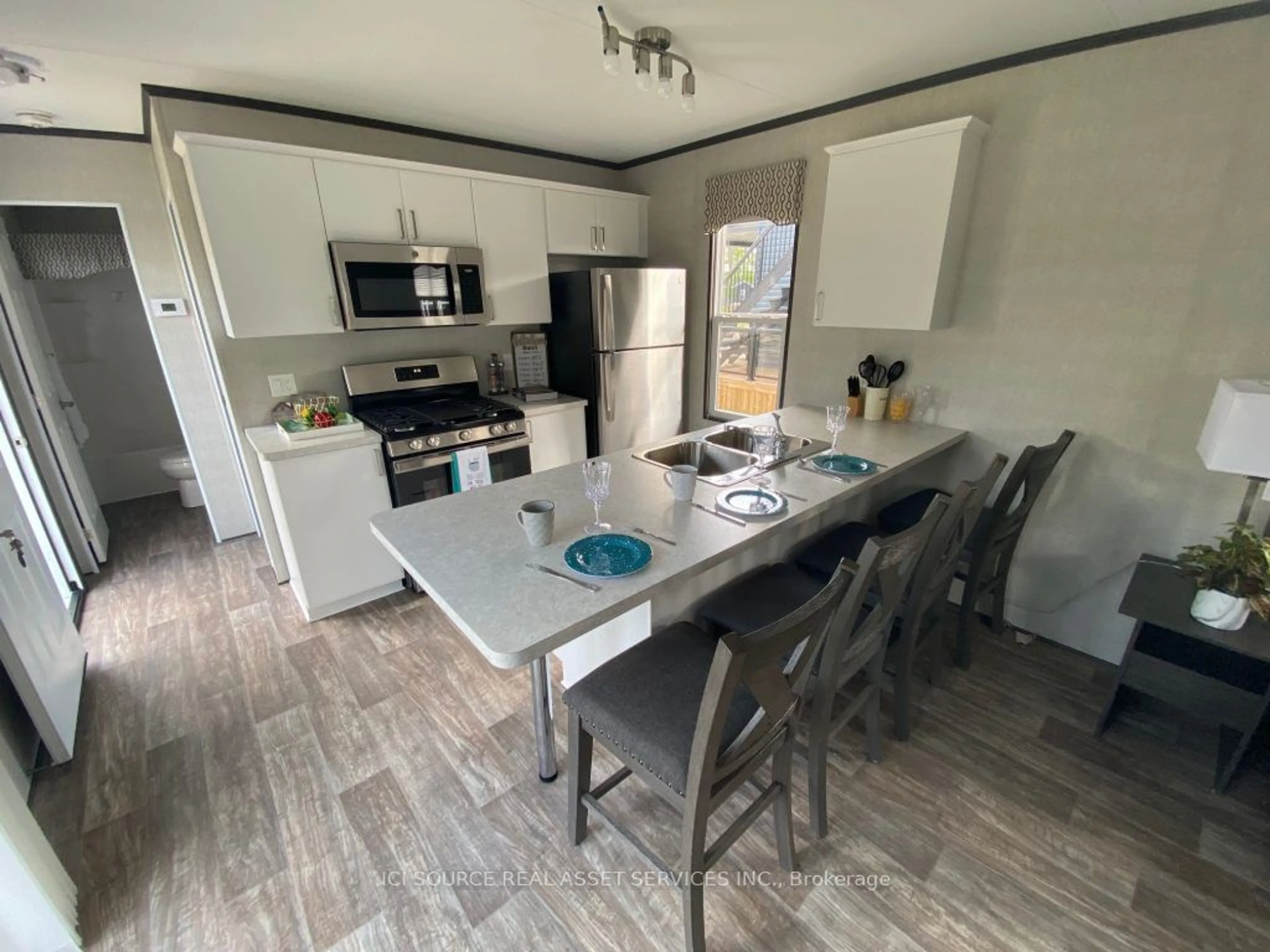 Open concept kitchen, unknown for 1082 Shamrock Marina Rd #65, Gravenhurst Ontario P0E 1N0