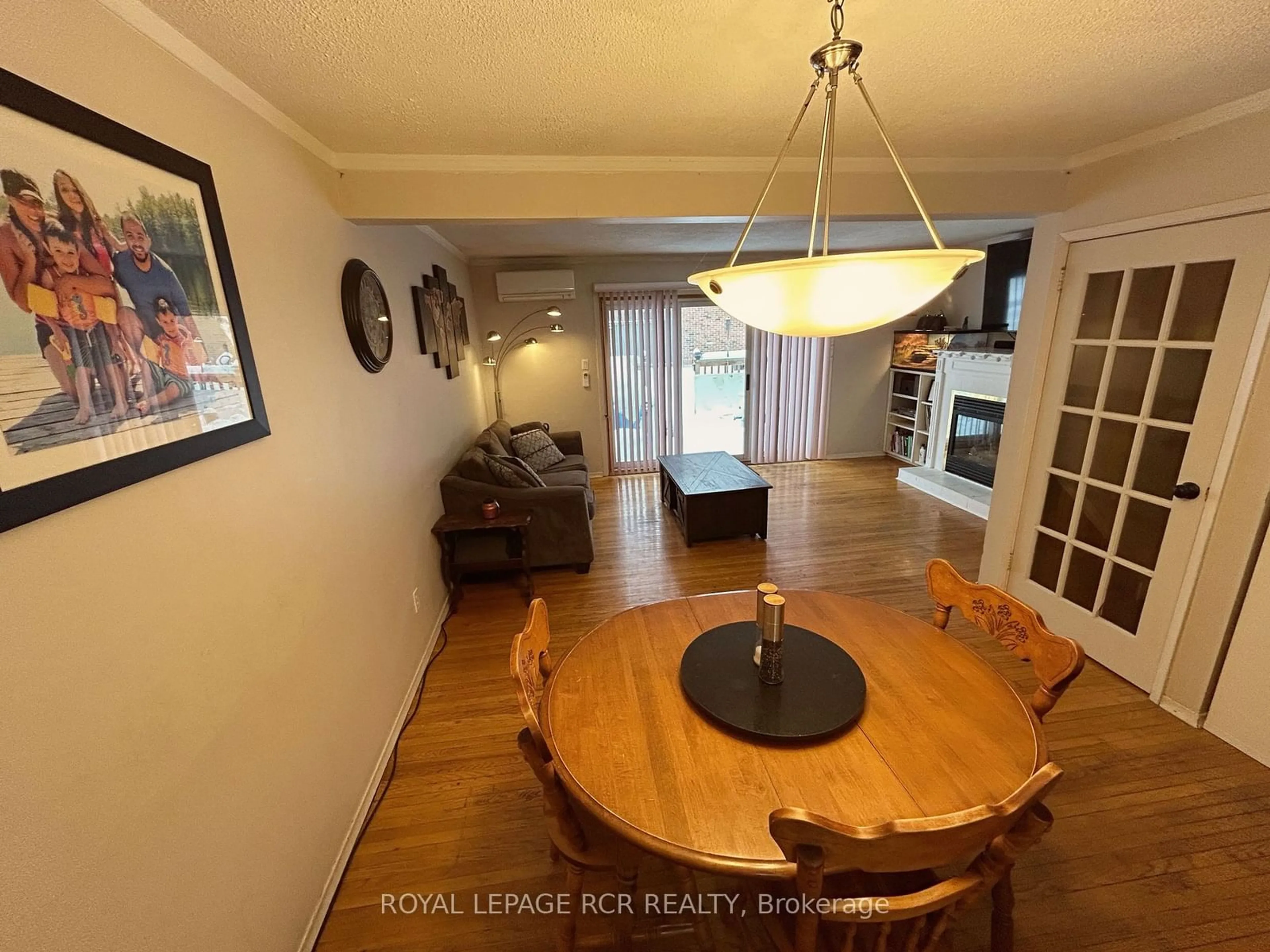 Dining room, wood/laminate floor for 201 Silvercreek Pkwy #57, Guelph Ontario N1H 3T4