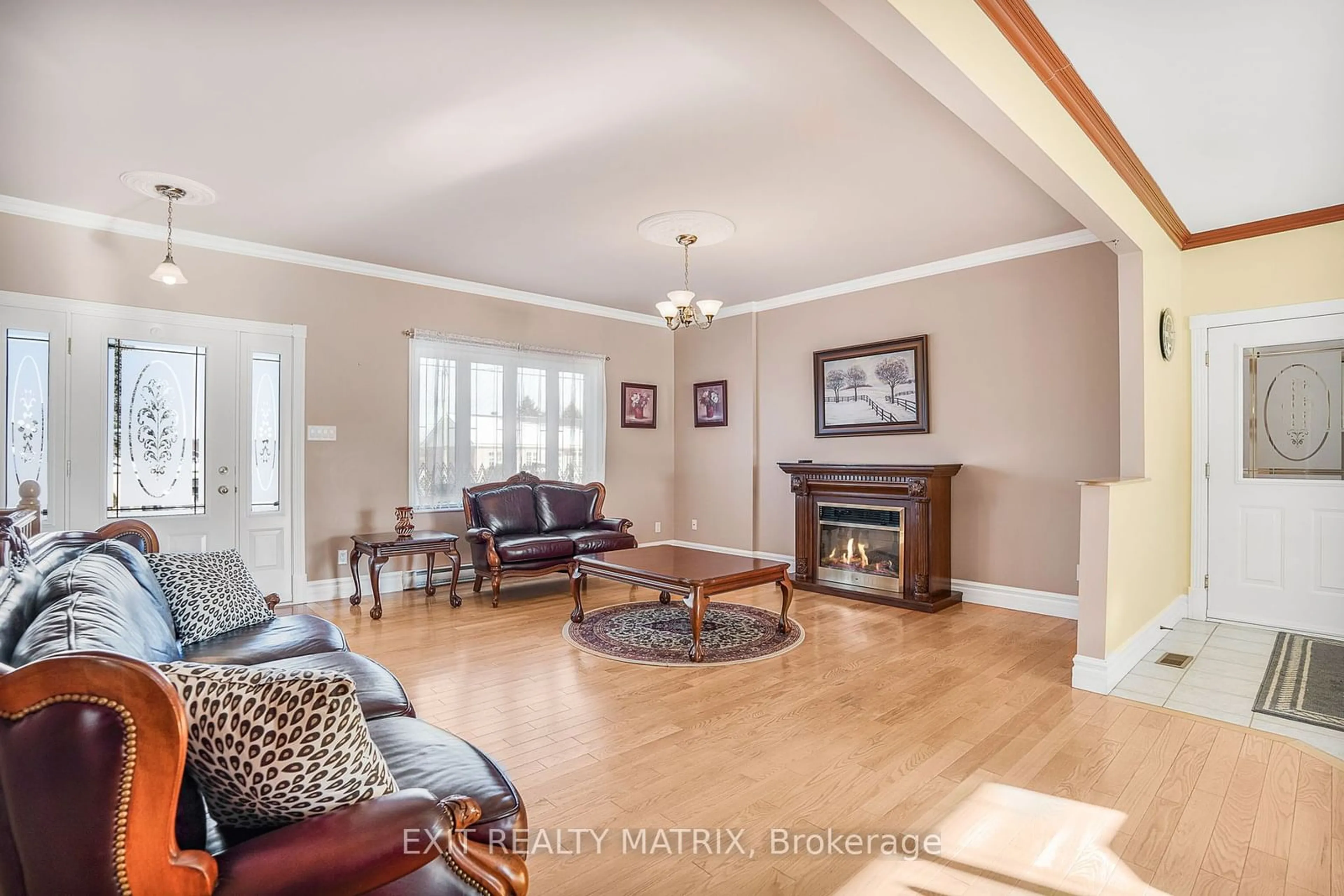 Living room with furniture, wood/laminate floor for 1854 Principale St, East Hawkesbury Ontario K0B 1A0