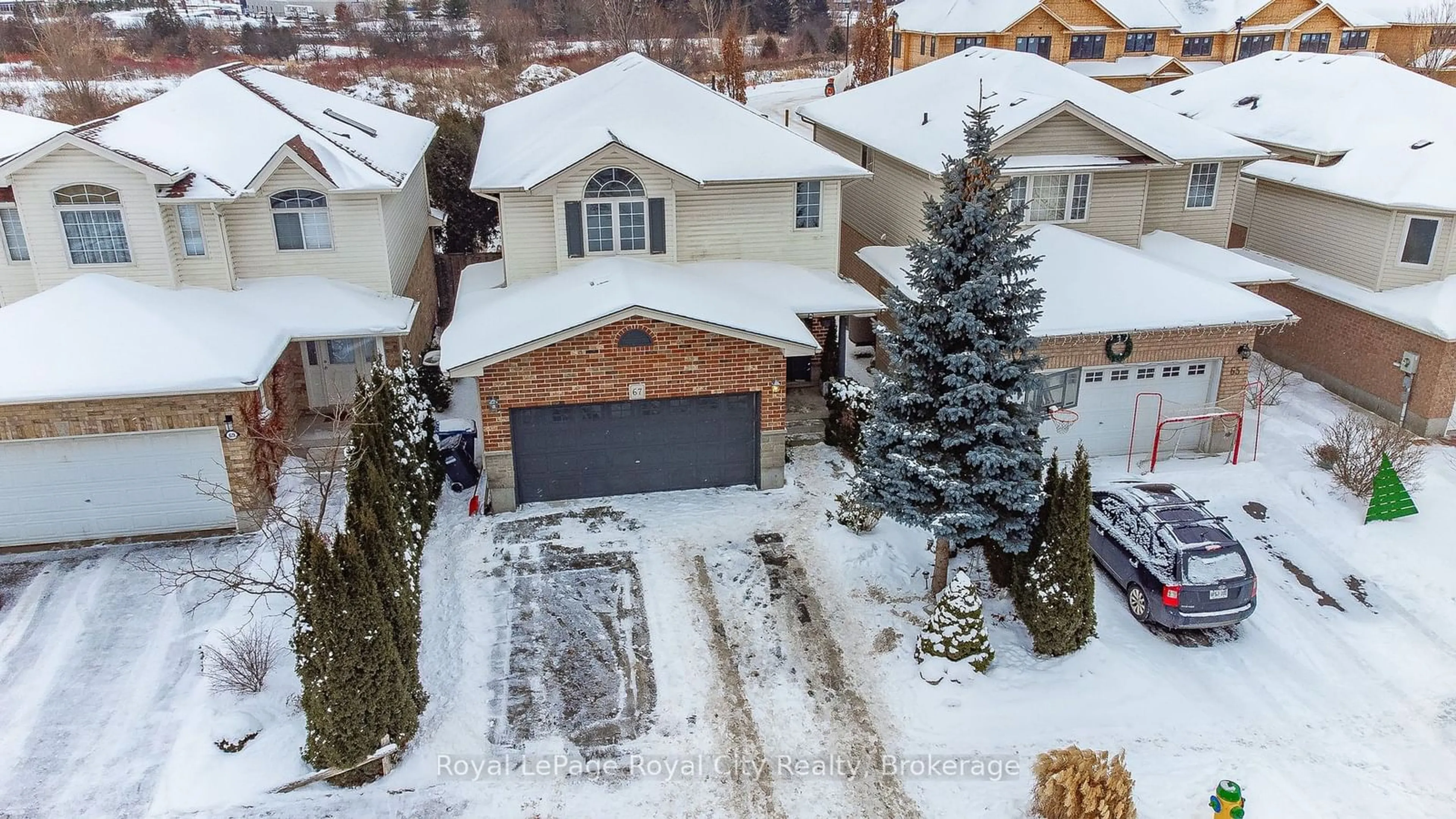 A pic from outside/outdoor area/front of a property/back of a property/a pic from drone, street for 67 Teal Dr, Guelph Ontario N1C 1G4