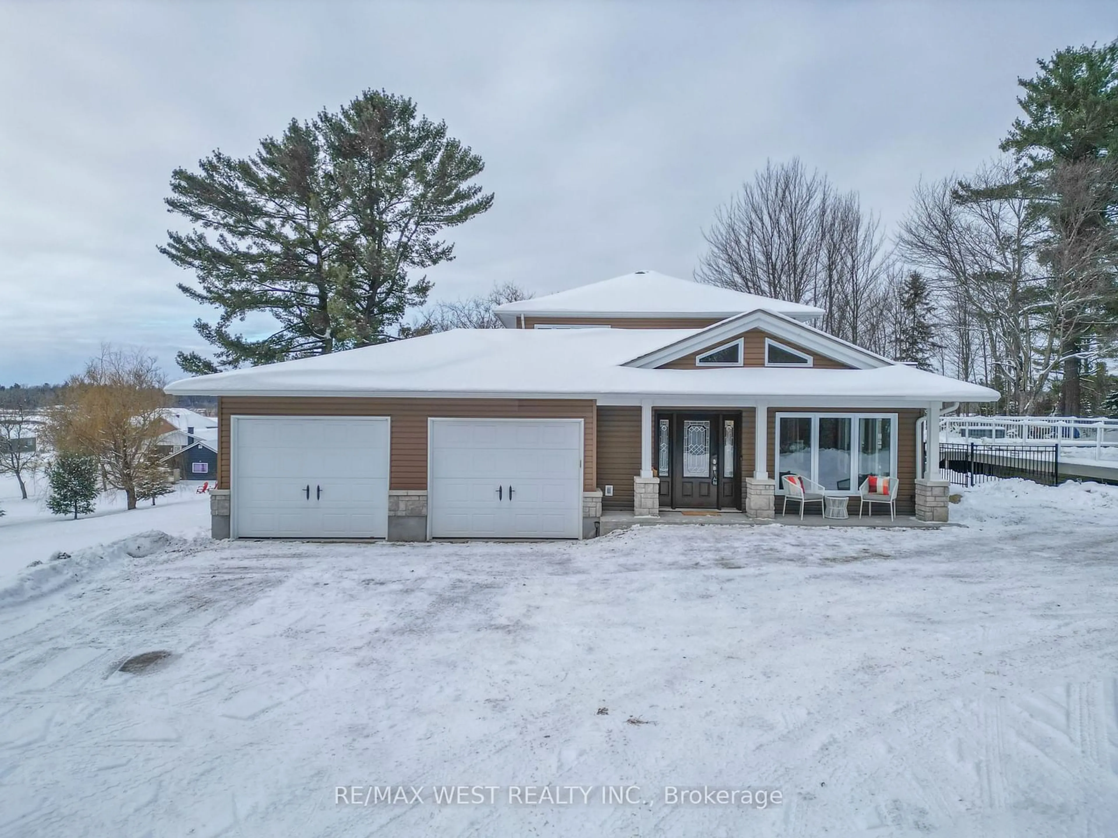 A pic from outside/outdoor area/front of a property/back of a property/a pic from drone, street for 222 Golf Course Rd, Callander Ontario P0H 1H0