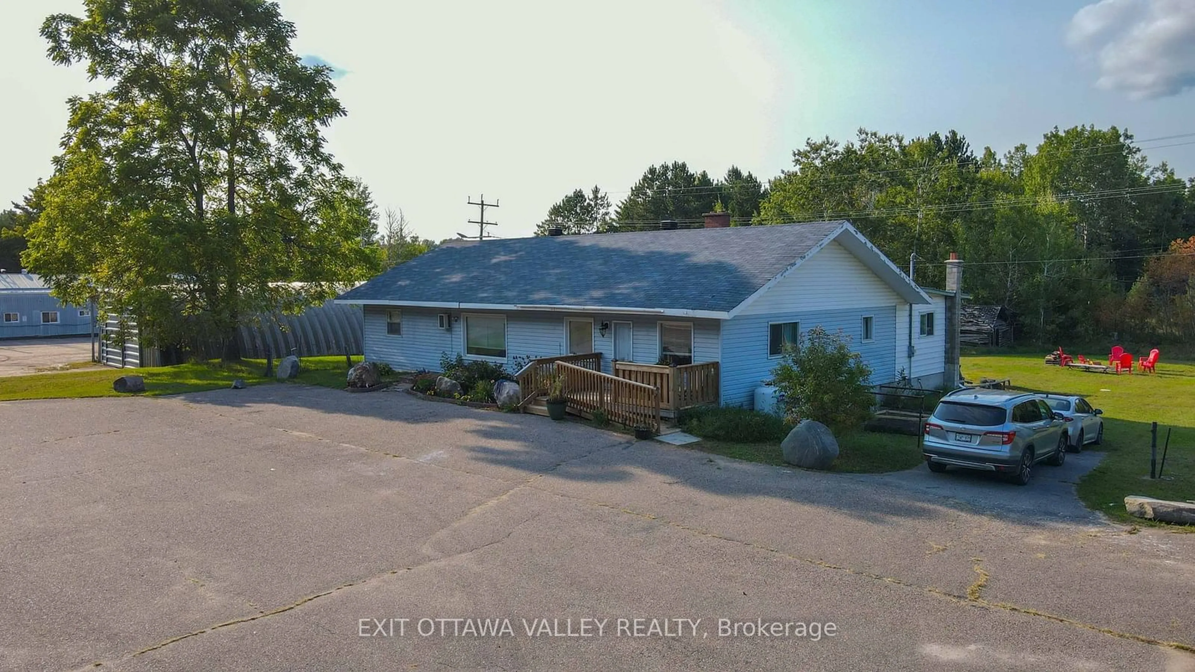 A pic from outside/outdoor area/front of a property/back of a property/a pic from drone, street for 16358 Highway 60 Ontario K0J 2A0