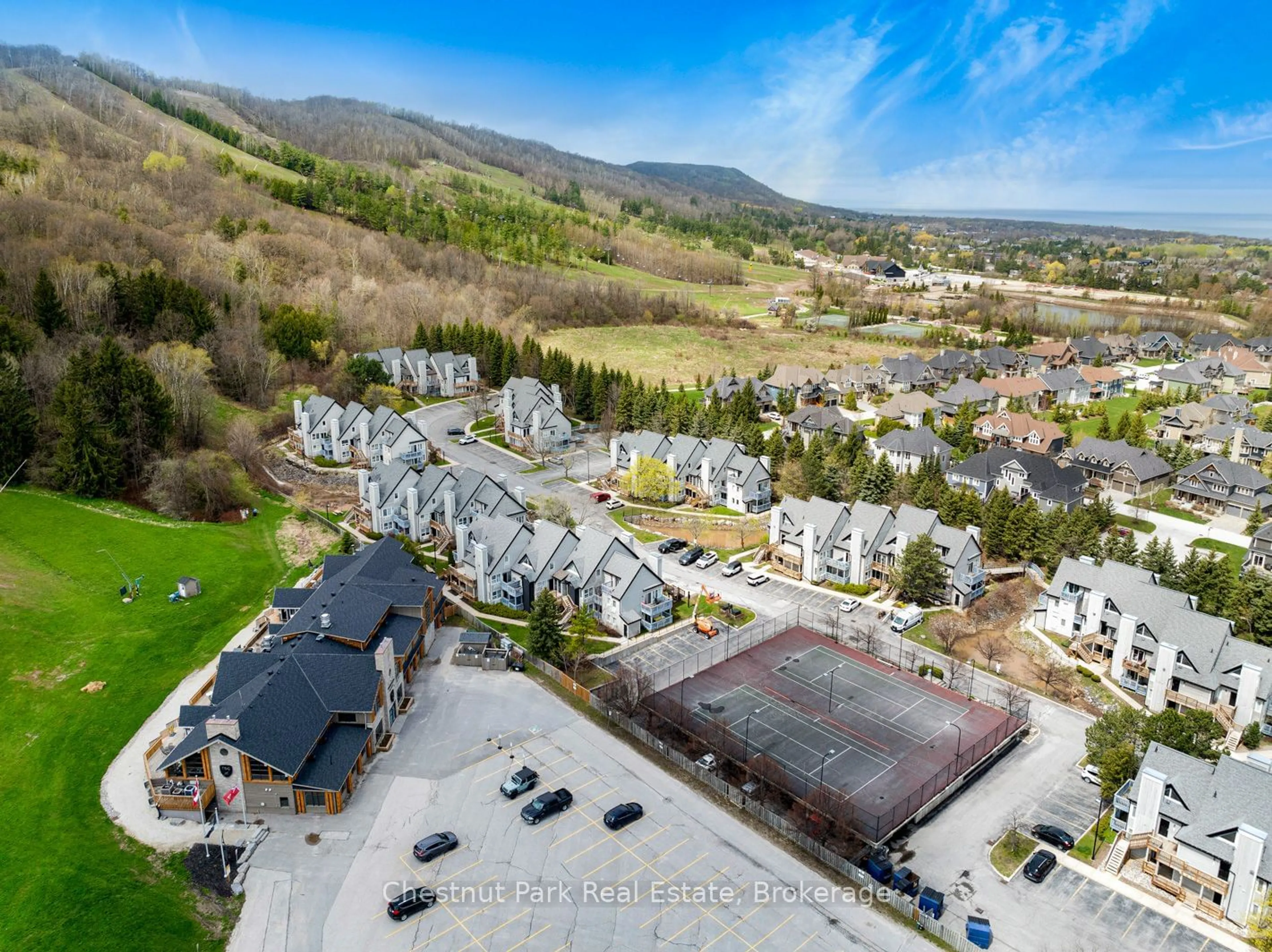 A pic from outside/outdoor area/front of a property/back of a property/a pic from drone, mountain view for 796468 Grey Road 19 #406, Blue Mountains Ontario L9Y 0N6