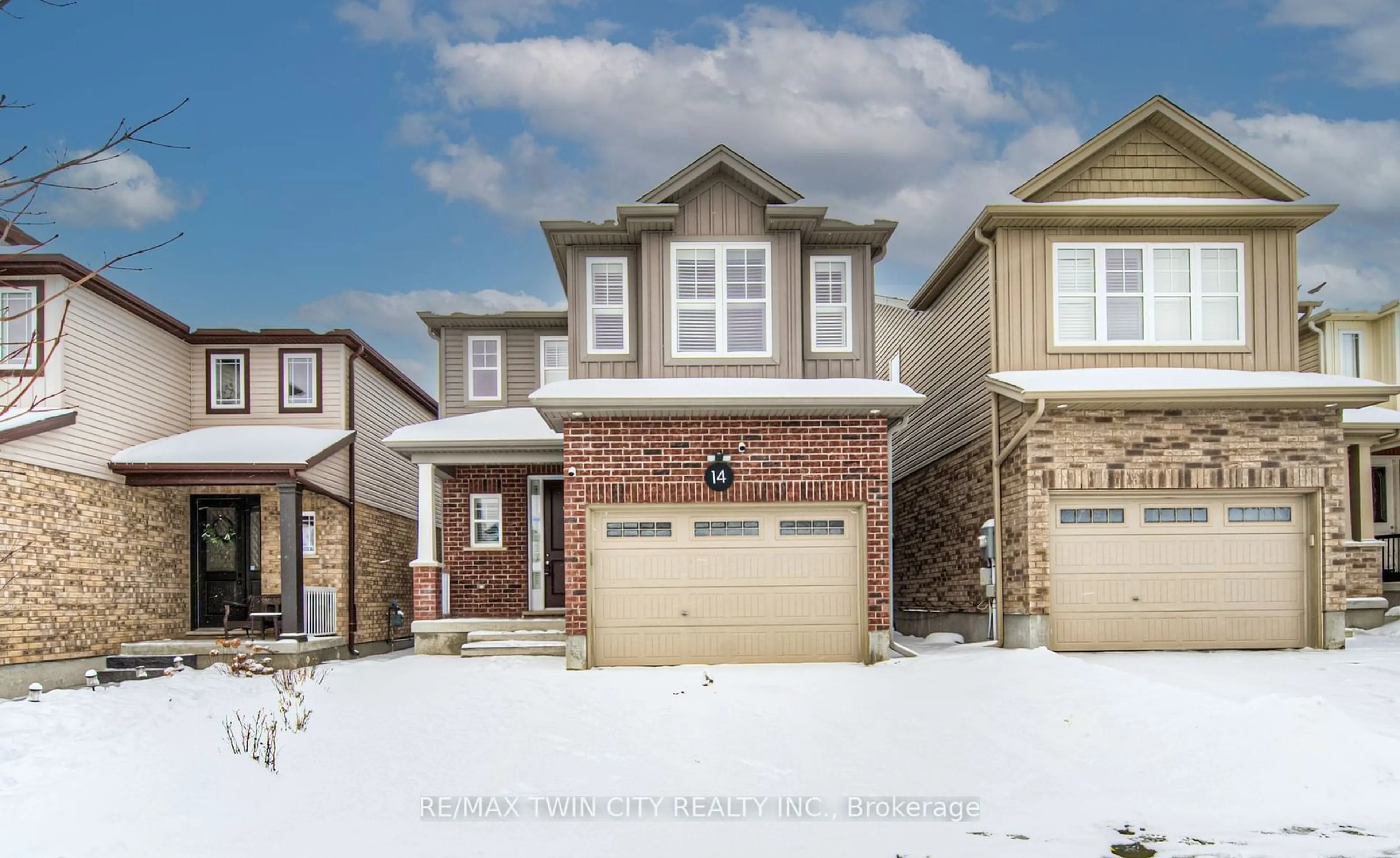 Home with brick exterior material, street for 14 Willowrun Dr, Kitchener Ontario N2A 0H5