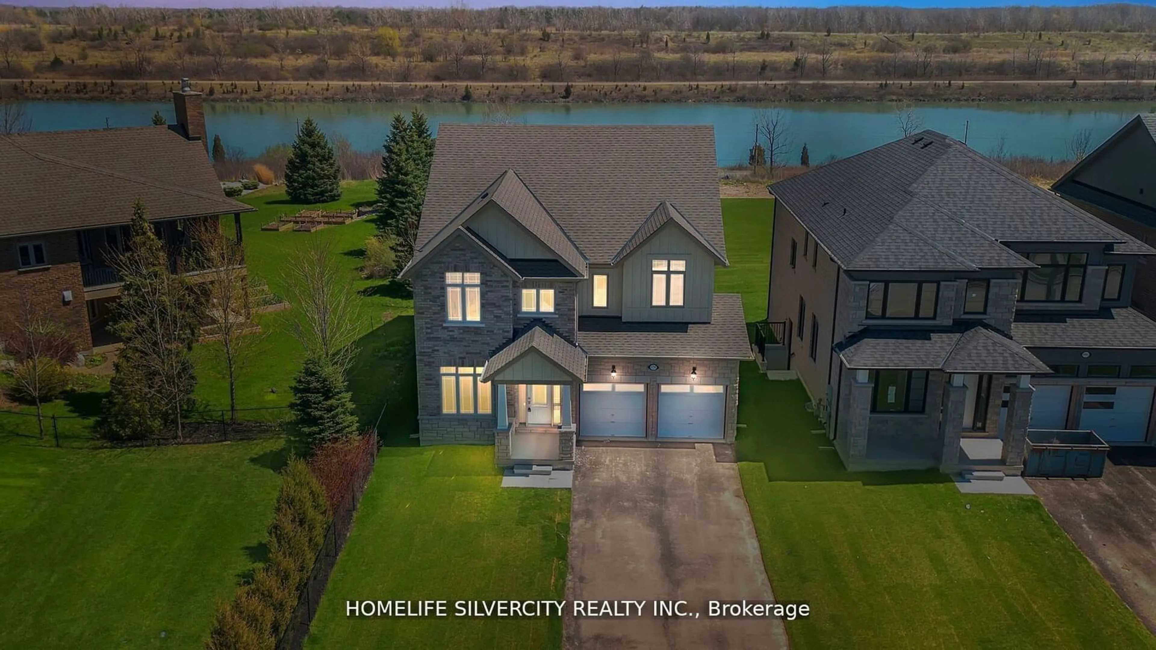 A pic from outside/outdoor area/front of a property/back of a property/a pic from drone, water/lake/river/ocean view for 678 Daimler Pkwy, Welland Ontario L3B 6H9