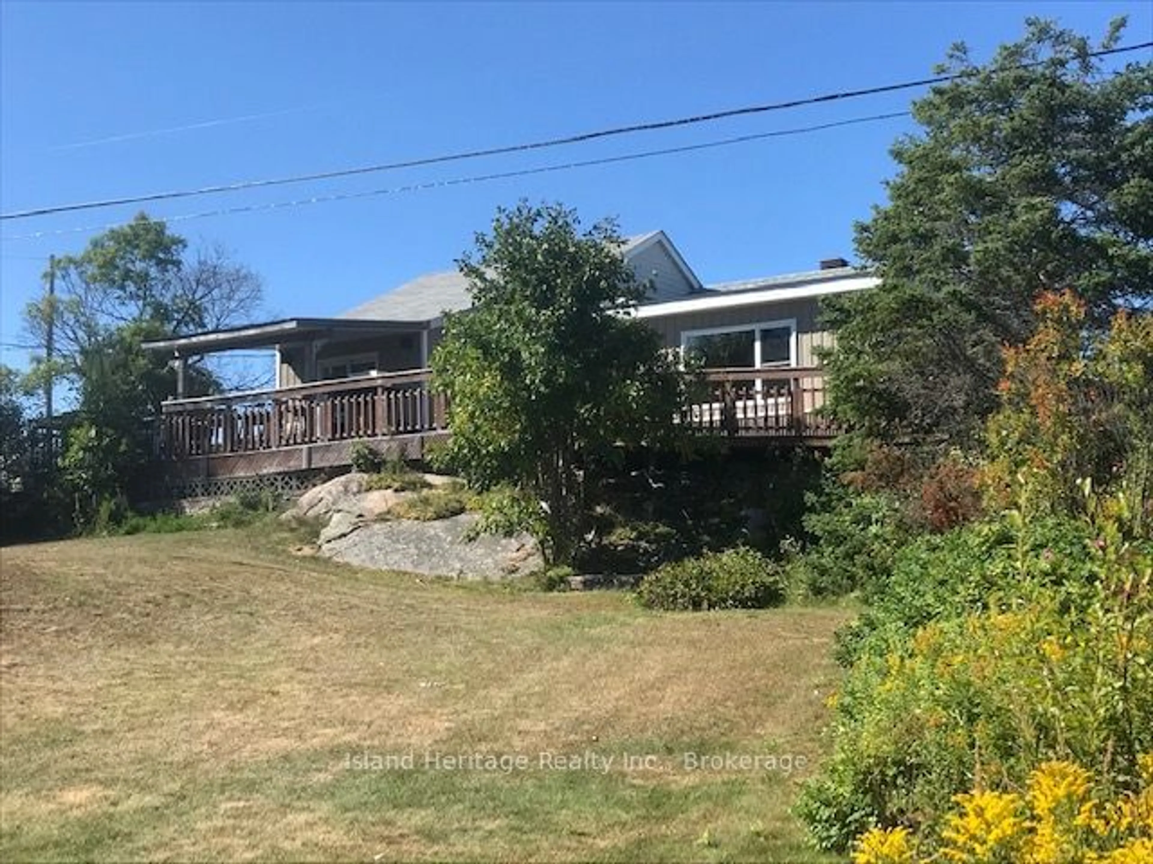 A pic from outside/outdoor area/front of a property/back of a property/a pic from drone, water/lake/river/ocean view for 1465 RIVERSIDE Dr, Parry Sound Ontario P0B 1G0