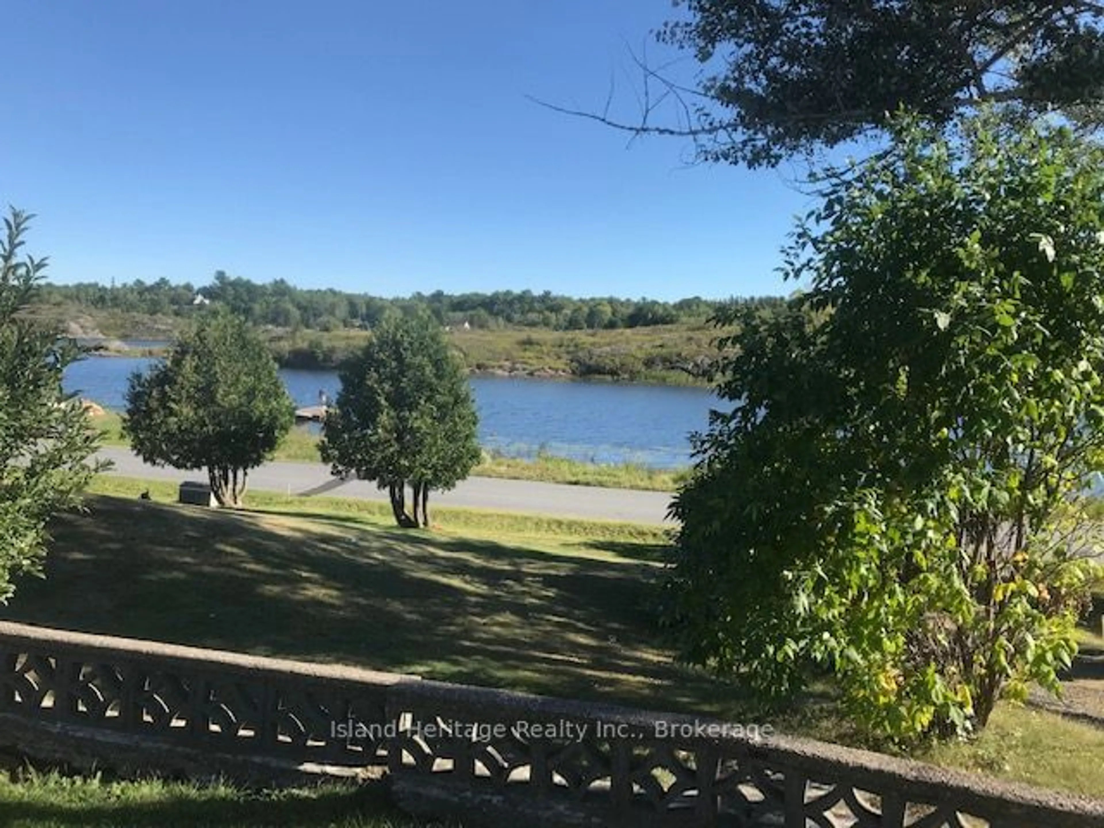 A pic from outside/outdoor area/front of a property/back of a property/a pic from drone, water/lake/river/ocean view for 1465 RIVERSIDE Dr, Parry Sound Ontario P0B 1G0