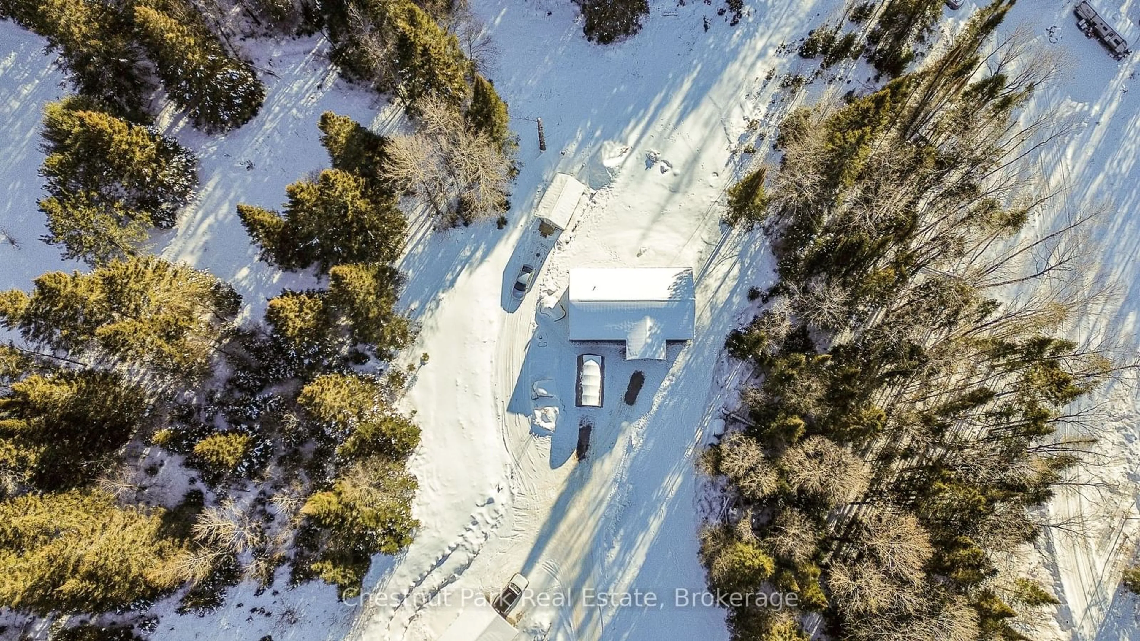 A pic from outside/outdoor area/front of a property/back of a property/a pic from drone, street for 1409 Chetwynd Rd, Armour Ontario P0A 1C0