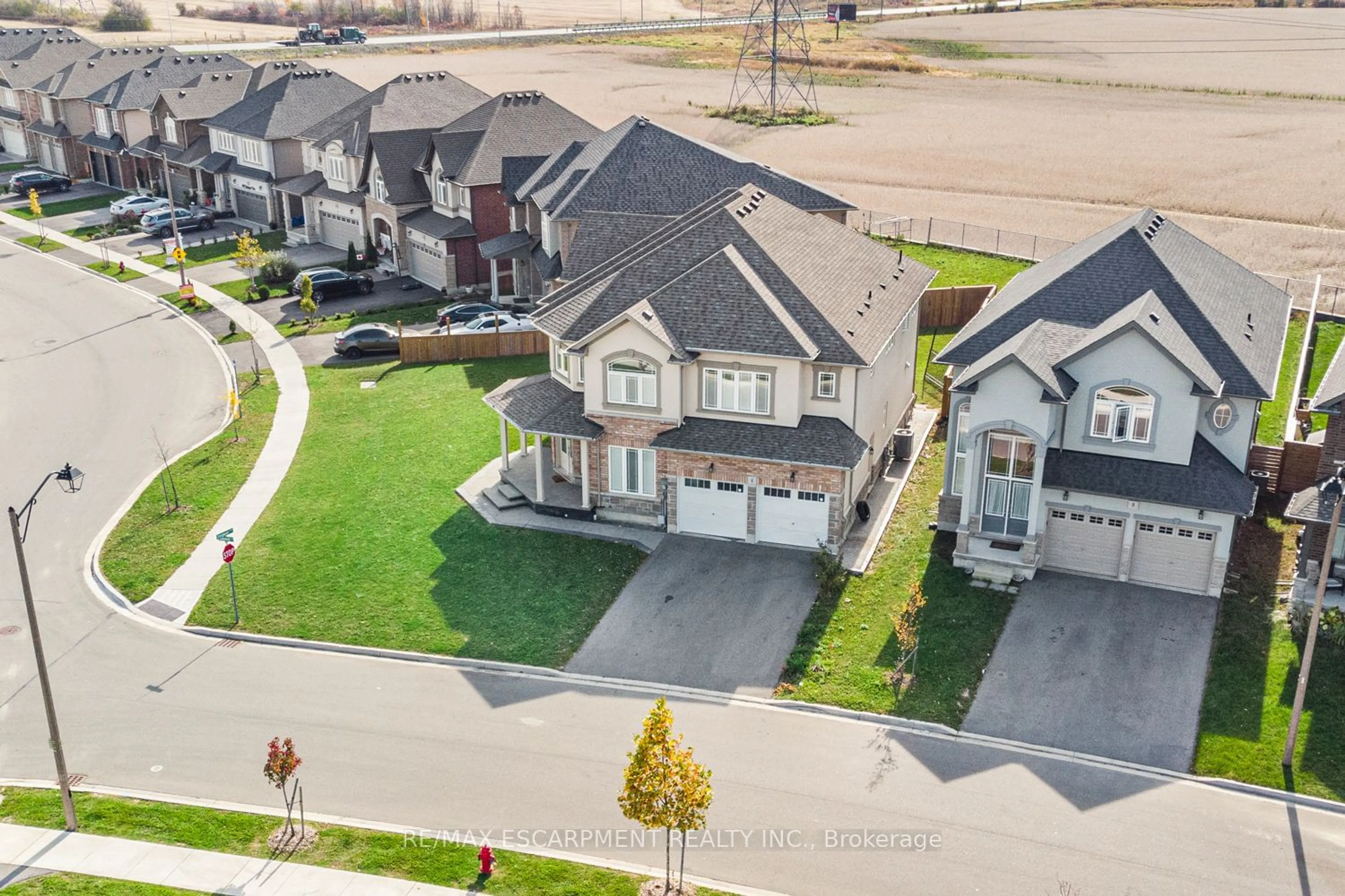 A pic from outside/outdoor area/front of a property/back of a property/a pic from drone, street for 4 Dolomiti Crt, Hamilton Ontario L0R 1P0