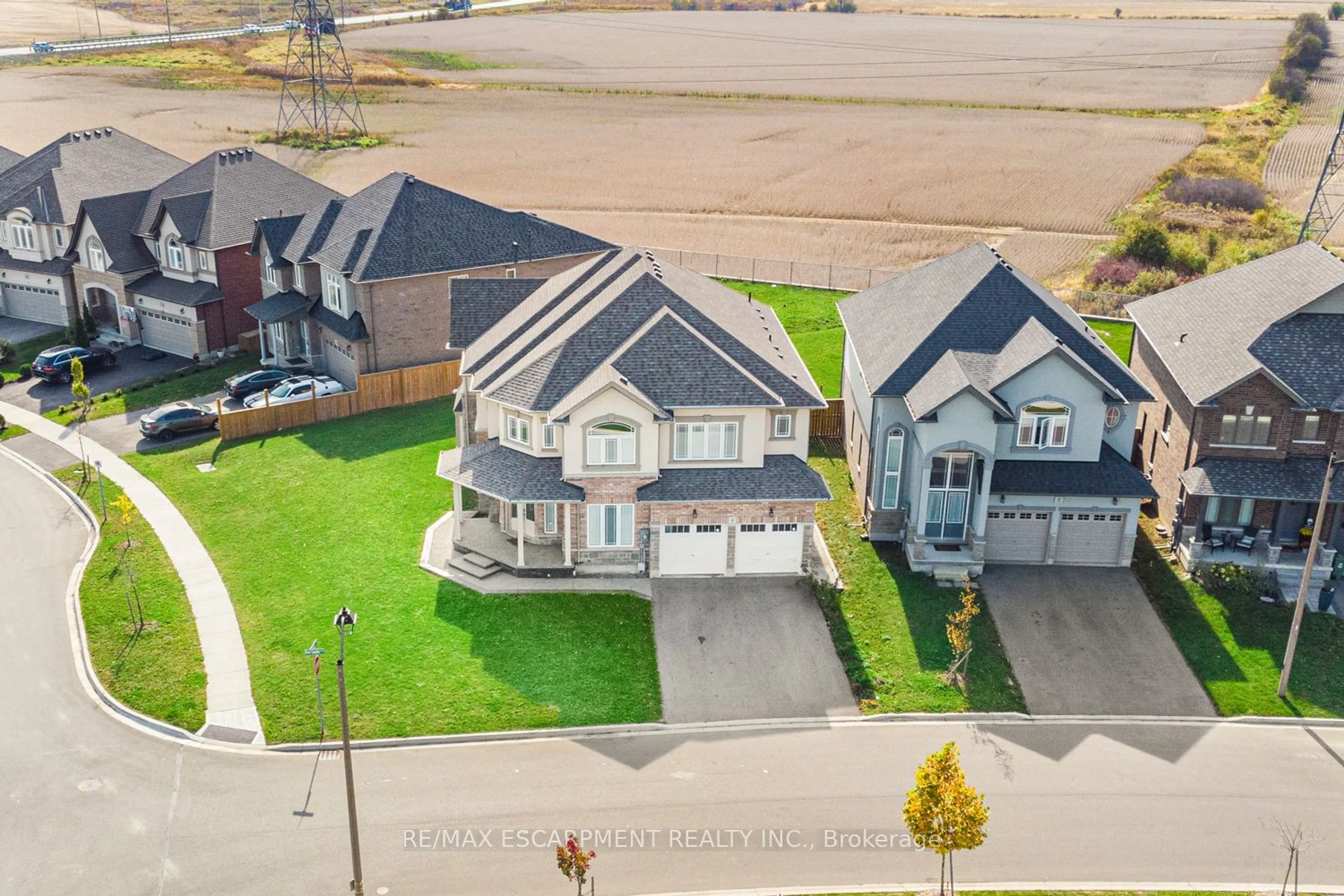 A pic from outside/outdoor area/front of a property/back of a property/a pic from drone, street for 4 Dolomiti Crt, Hamilton Ontario L0R 1P0