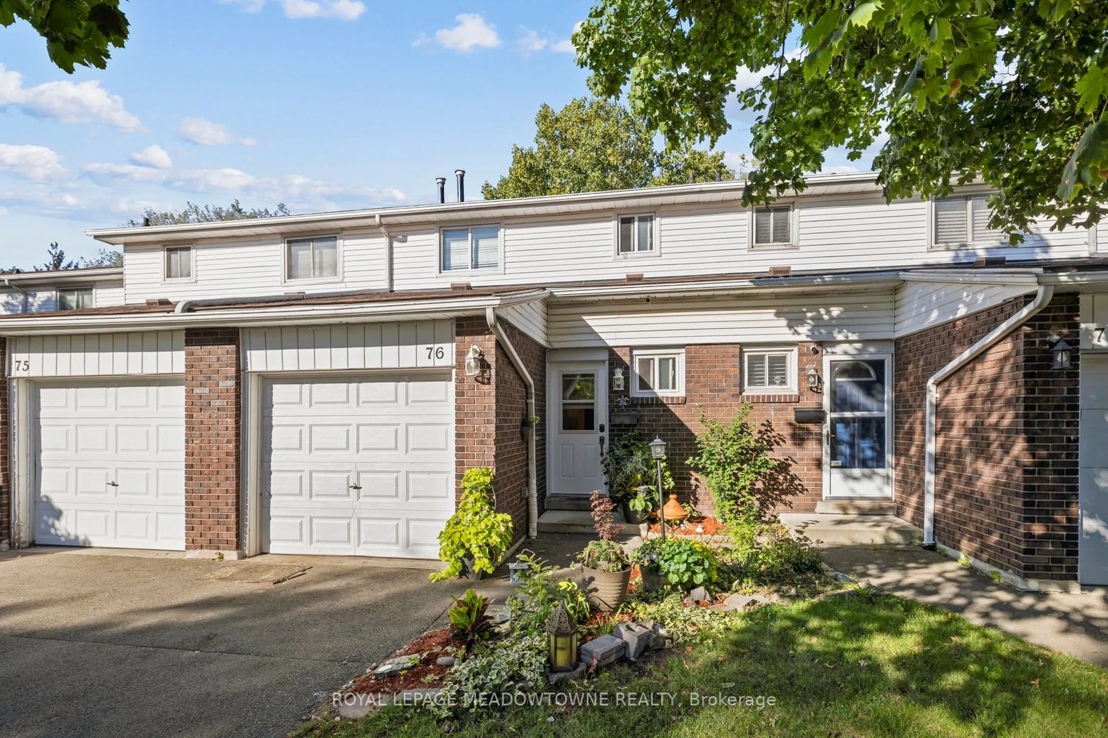 Home with brick exterior material, street for 100 Quigley Rd #76, Hamilton Ontario L8K 6J1