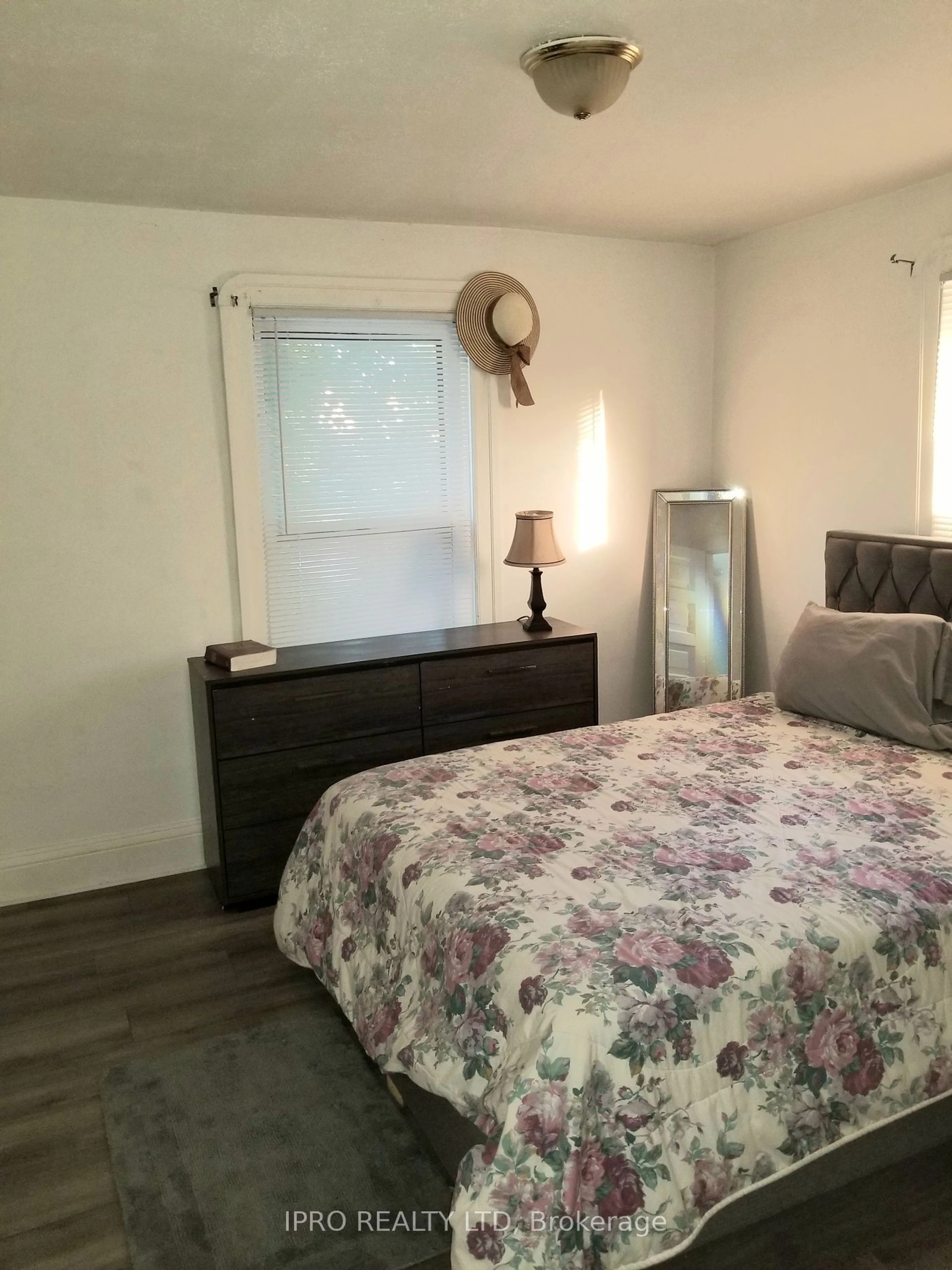 Bedroom with bed, wood/laminate floor for 304 Queen St, Chatham-Kent Ontario N7M 2H6