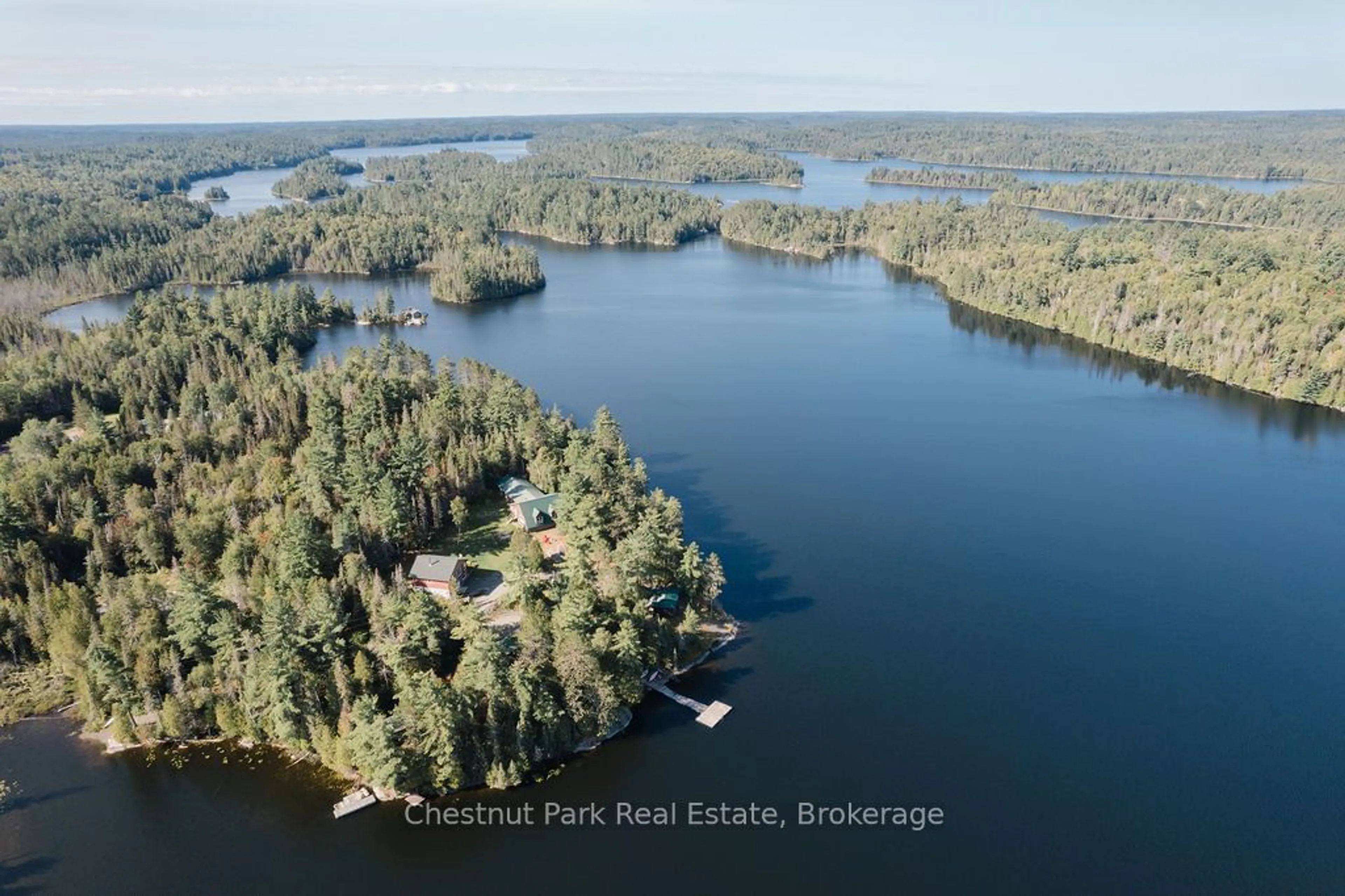 A pic from outside/outdoor area/front of a property/back of a property/a pic from drone, water/lake/river/ocean view for 4574 Highway 11, Temagami Ontario P0H 2H0