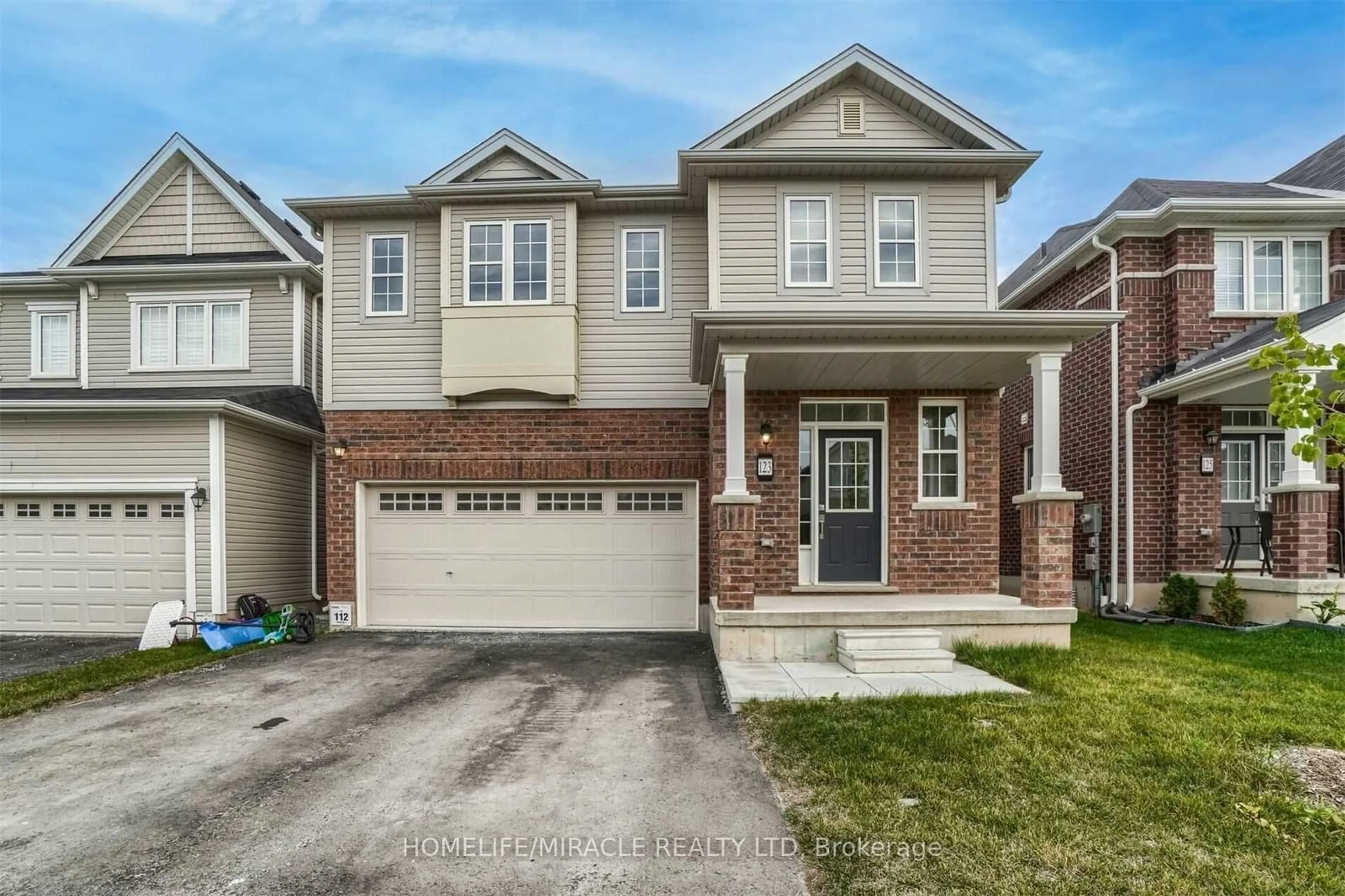 Home with brick exterior material, street for 123 Longboat Run, Brantford Ontario N3T 0R8