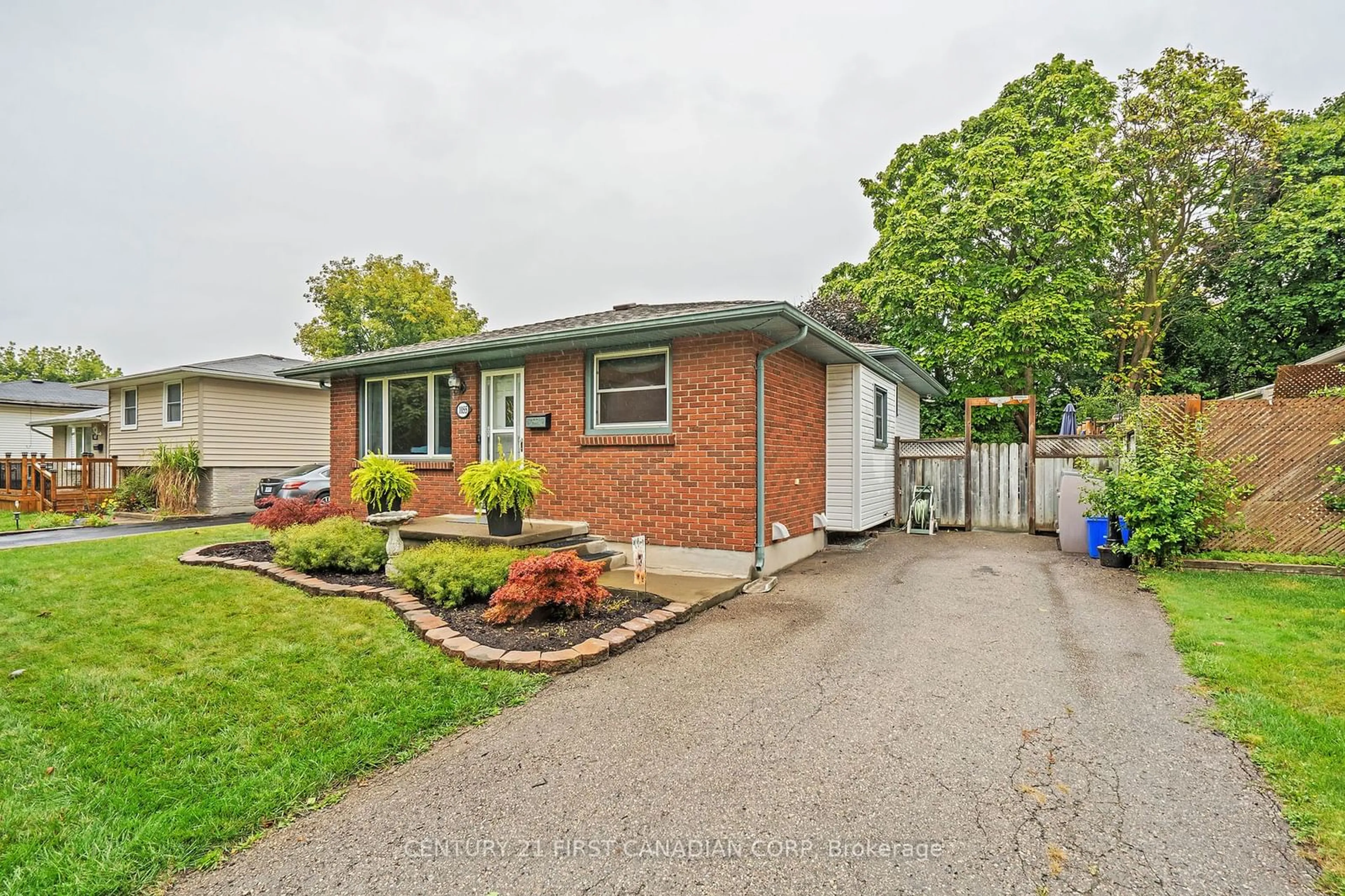 Home with brick exterior material, street for 1055 Osgoode Dr, London Ontario N6E 1E3