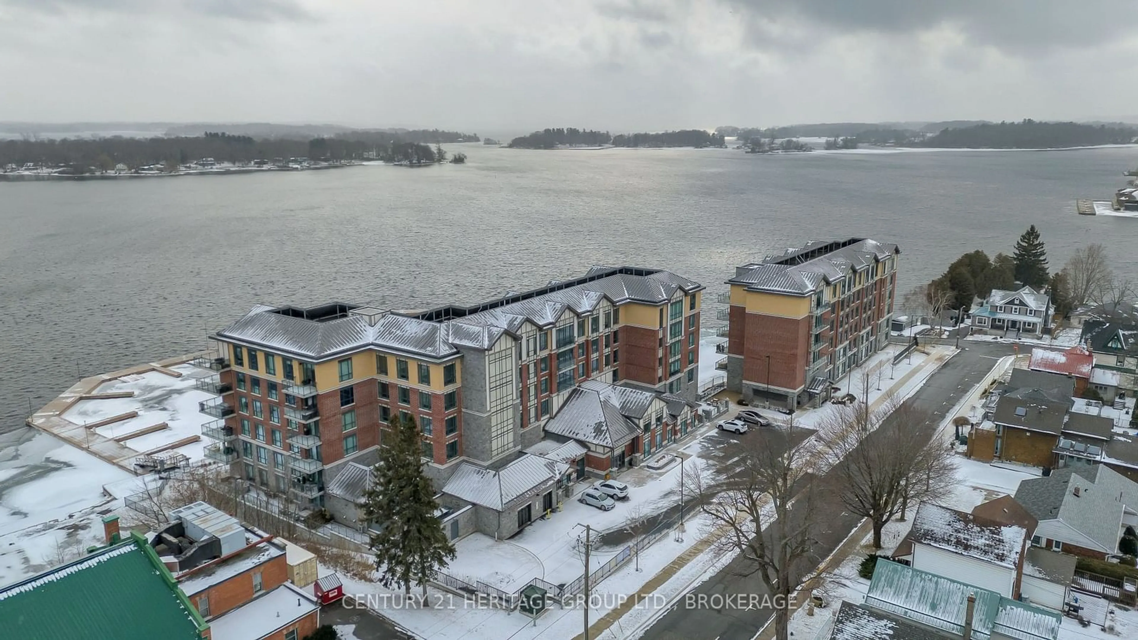 A pic from outside/outdoor area/front of a property/back of a property/a pic from drone, water/lake/river/ocean view for 129 South St #510, Gananoque Ontario K7G 0B1