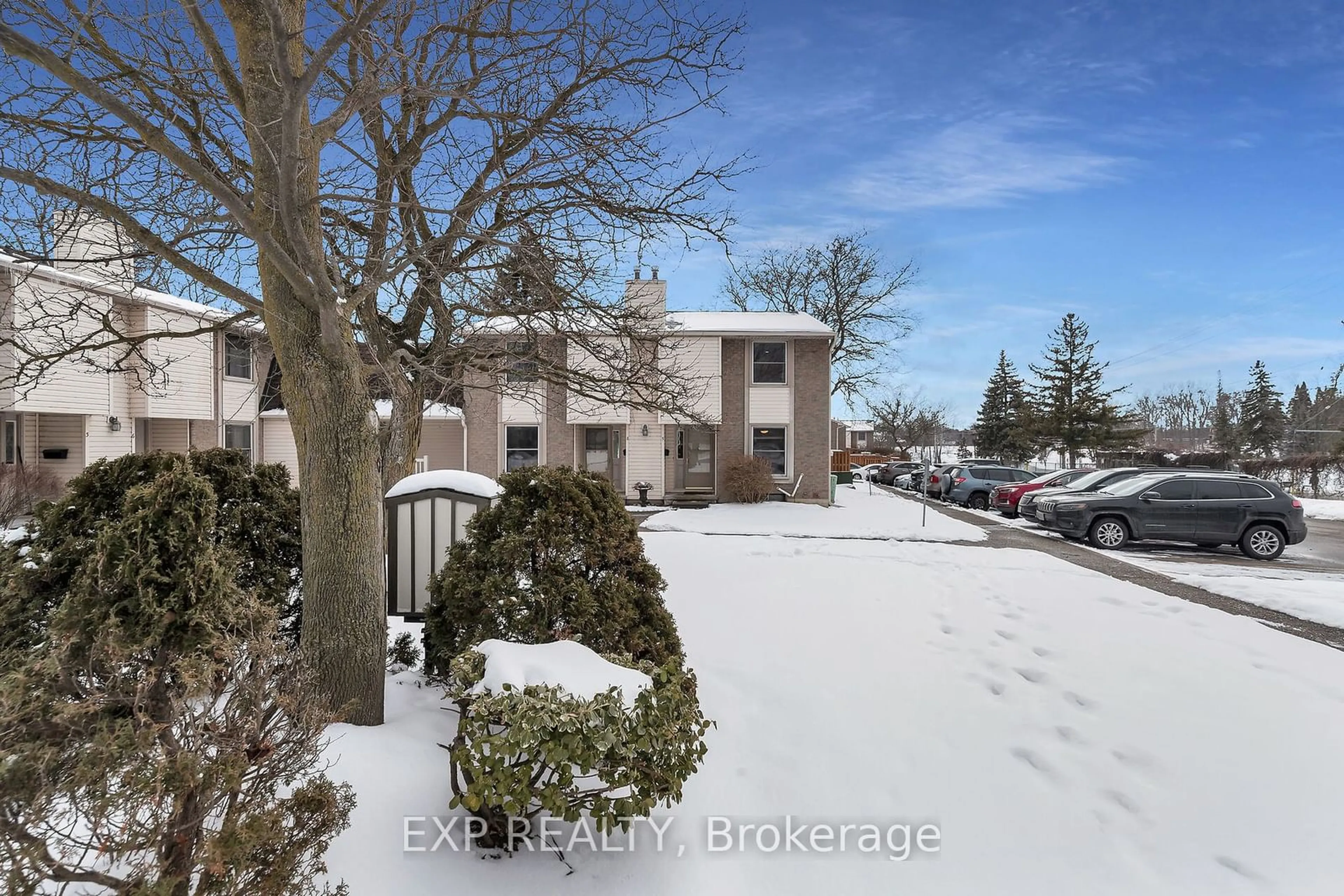 A pic from outside/outdoor area/front of a property/back of a property/a pic from drone, street for 11 Grand River Blvd #9, Kitchener Ontario N2A 2T2