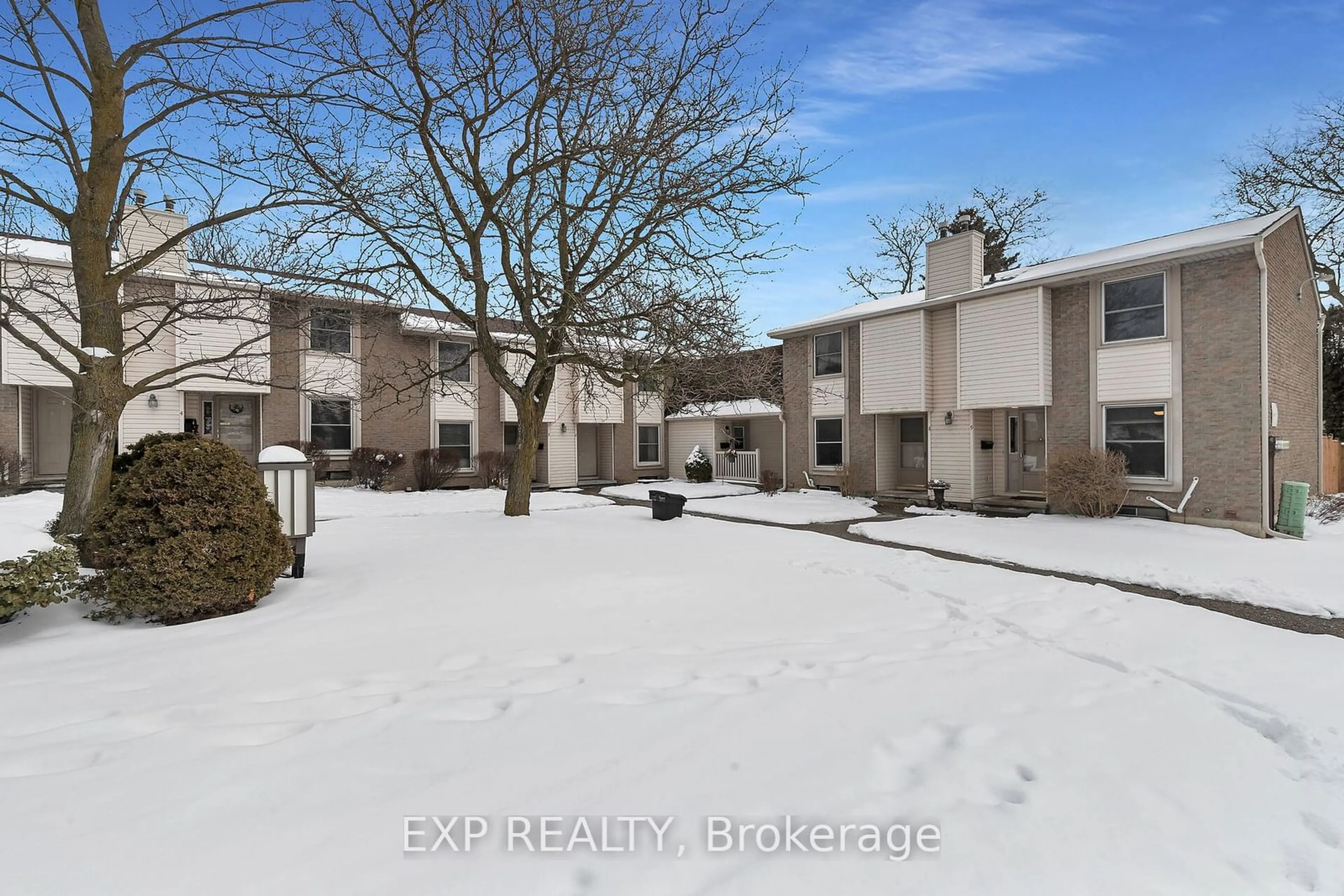 A pic from outside/outdoor area/front of a property/back of a property/a pic from drone, street for 11 Grand River Blvd #9, Kitchener Ontario N2A 2T2