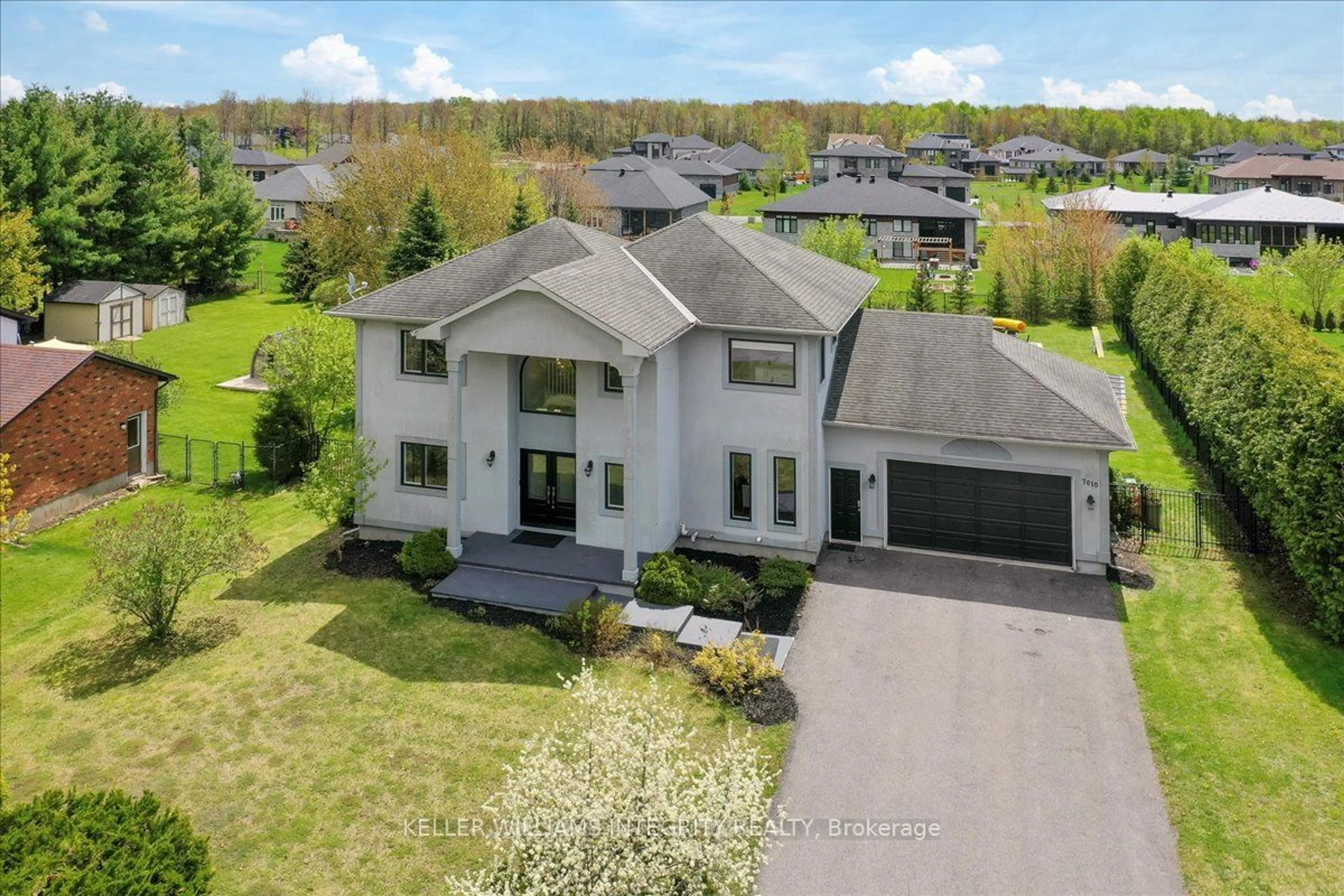 A pic from outside/outdoor area/front of a property/back of a property/a pic from drone, street for 7010 DONWEL Dr, Greely - Metcalfe - Osgoode - Vernon and Area Ontario K4P 1M7