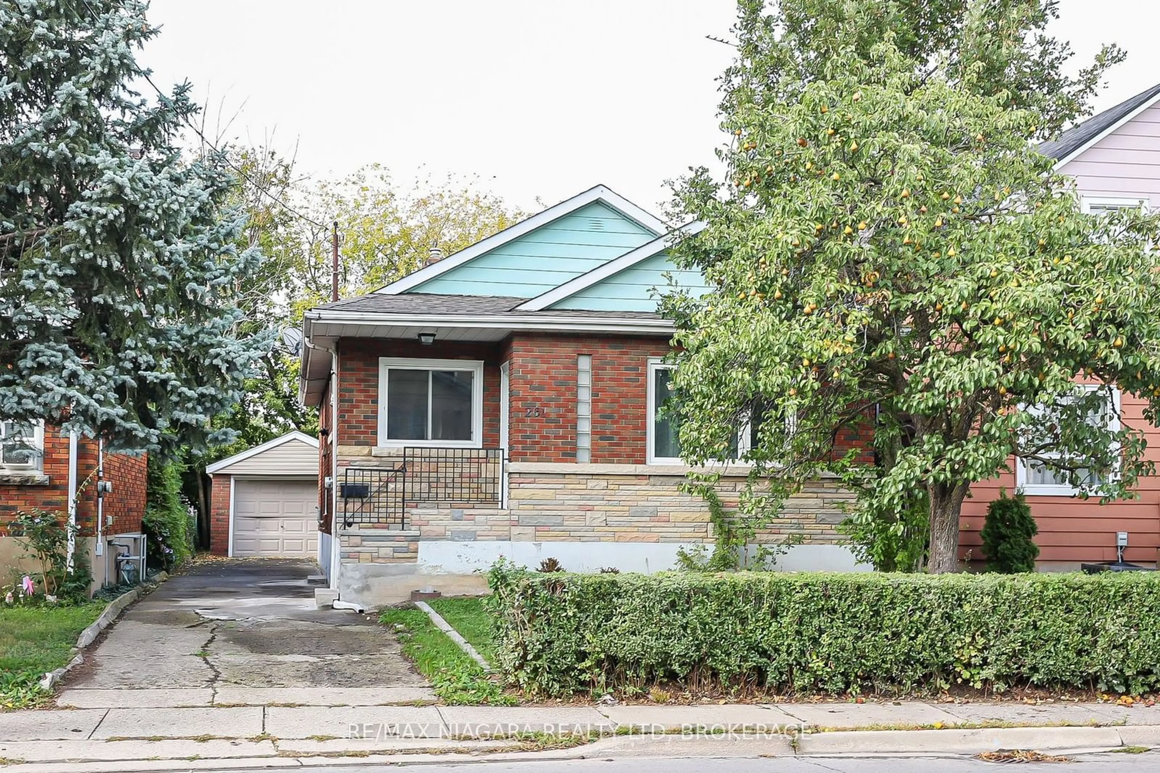 Home with brick exterior material, street for 261 Vine St, St. Catharines Ontario L2M 4T2