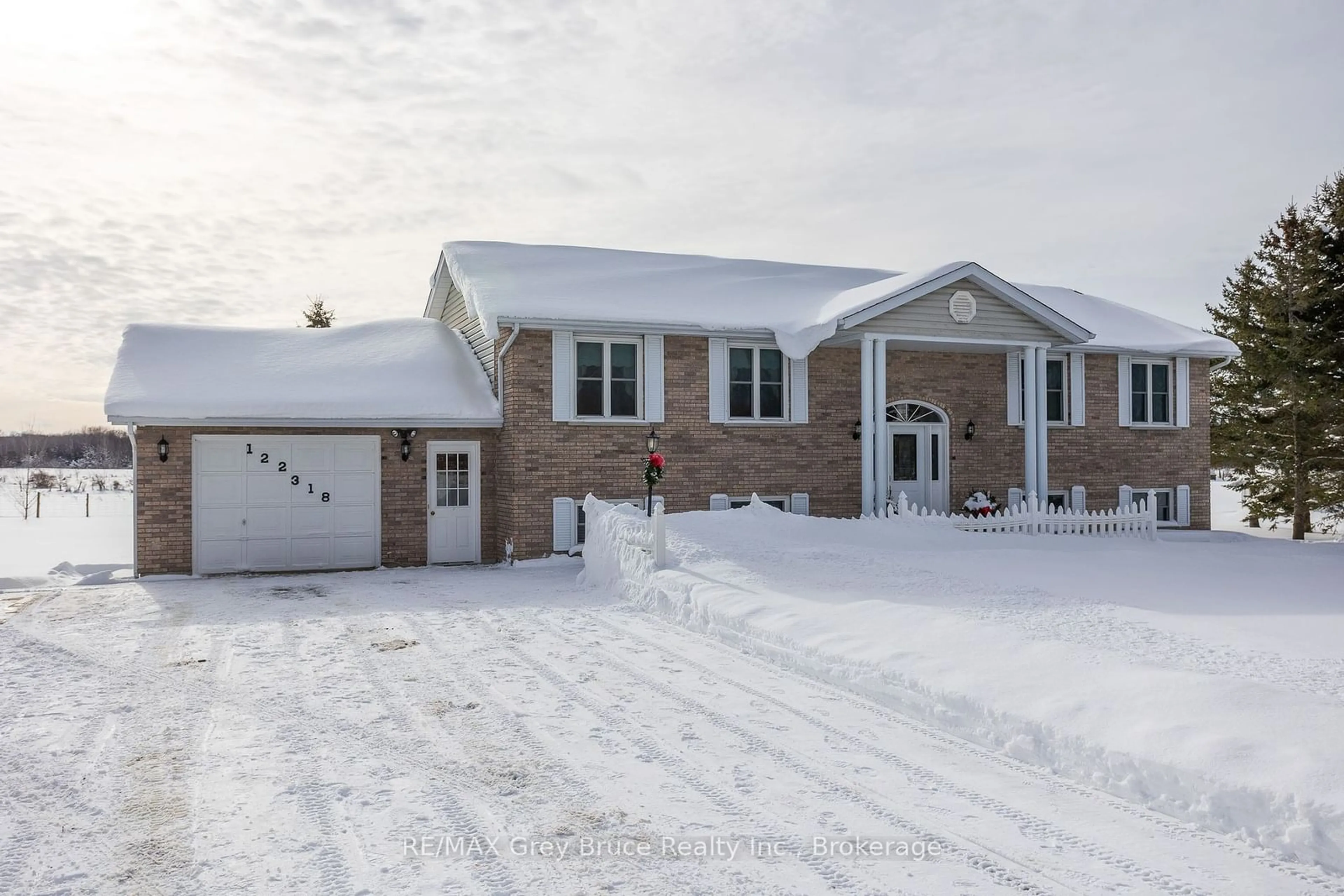 Home with brick exterior material, street for 122318 Grey Road 5 Rd, Georgian Bluffs Ontario N4K 5N5