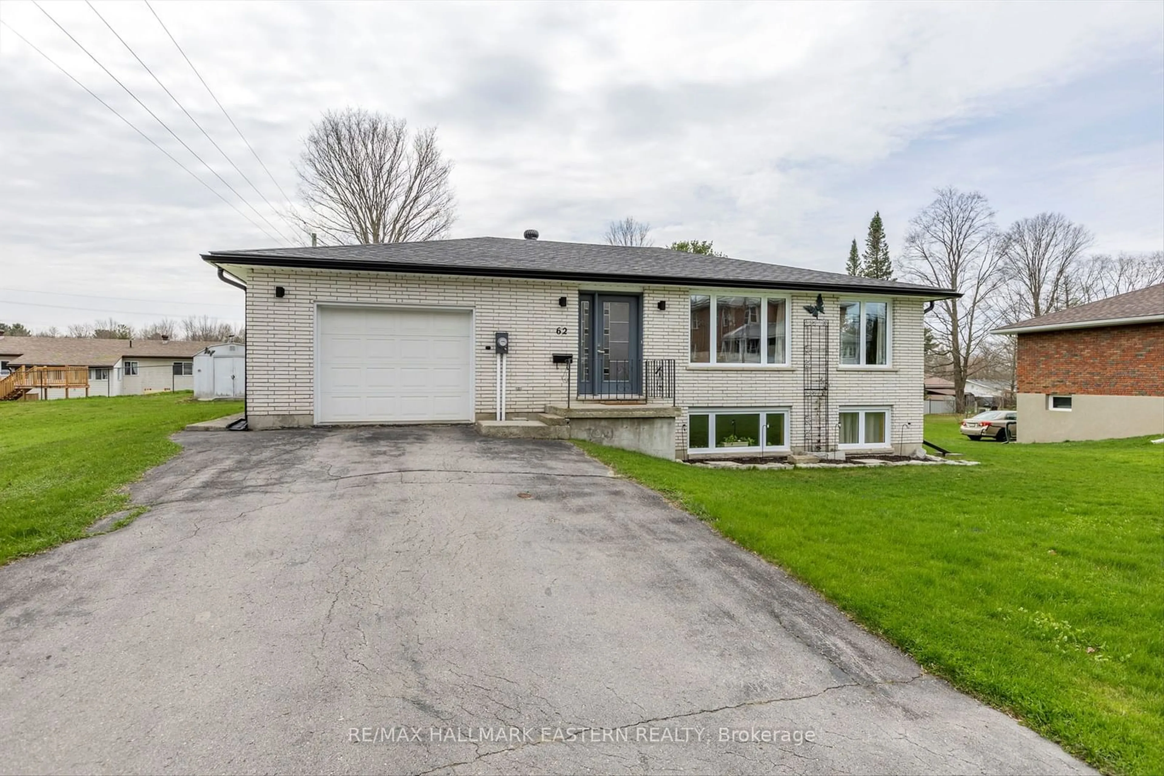 Home with brick exterior material, street for 62 Madoc St, Marmora and Lake Ontario K0K 2M0