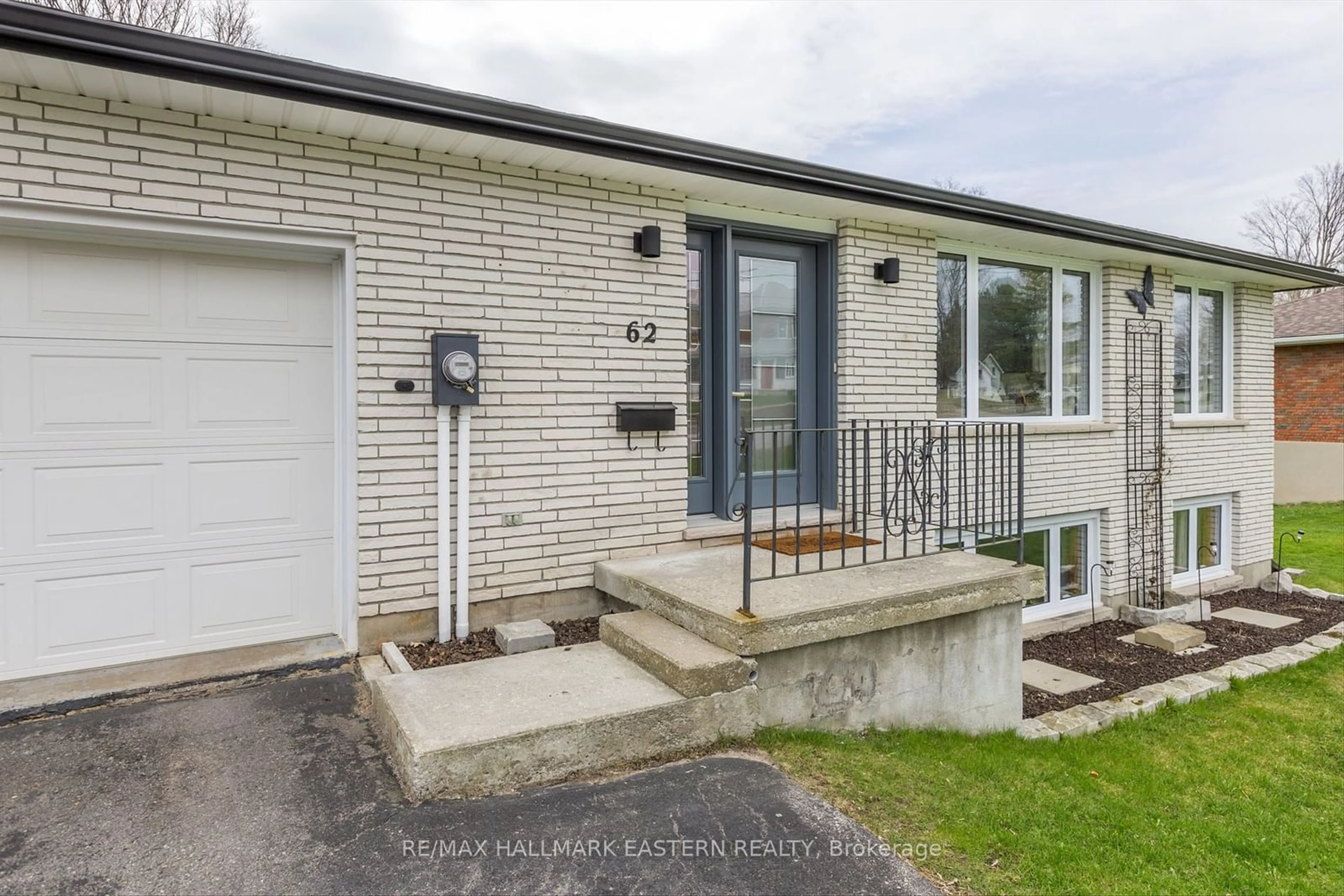 Home with brick exterior material, street for 62 Madoc St, Marmora and Lake Ontario K0K 2M0