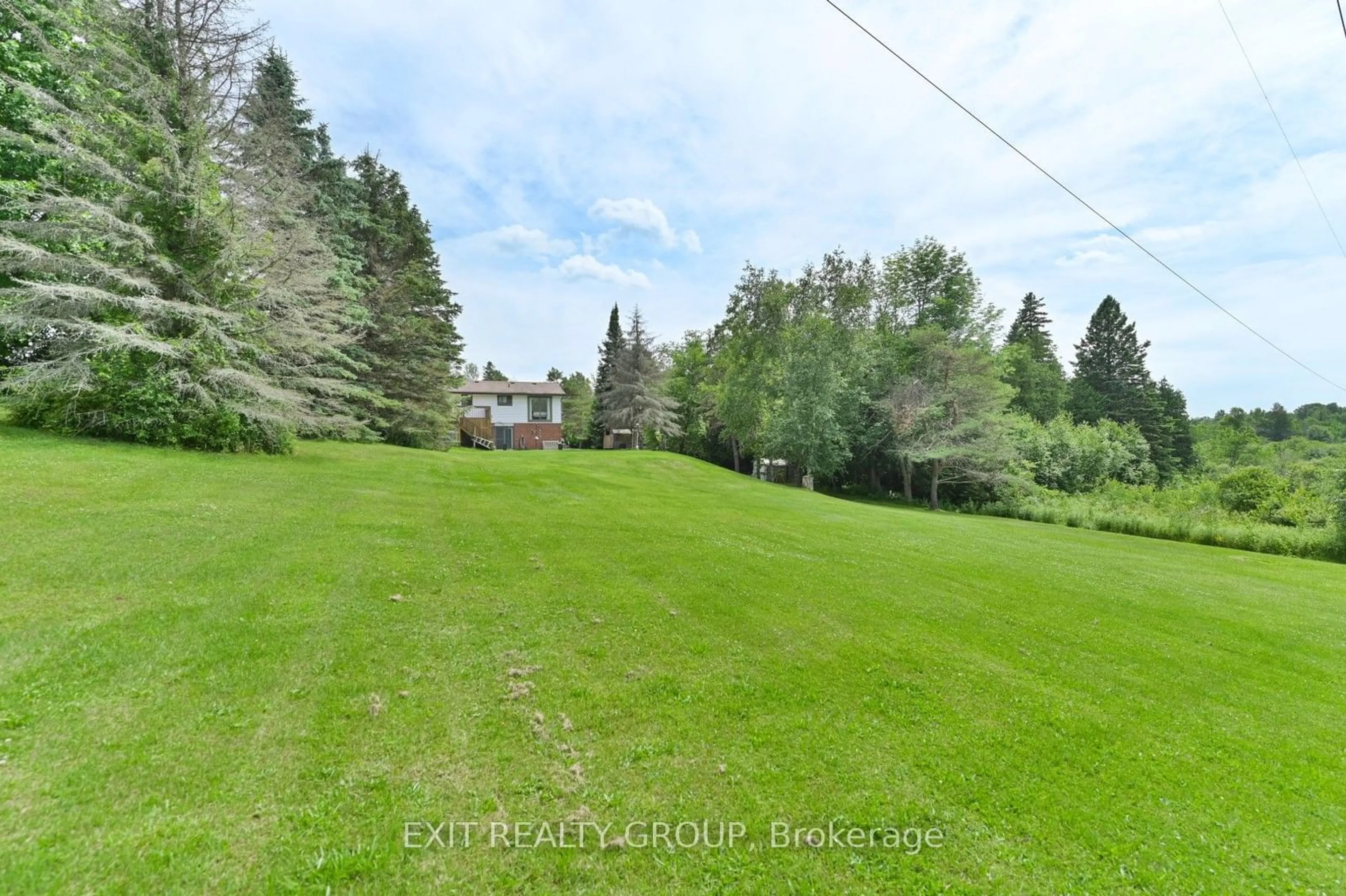 A pic from outside/outdoor area/front of a property/back of a property/a pic from drone, forest/trees view for 18 Laver Cres, Trent Hills Ontario K0K 3K0