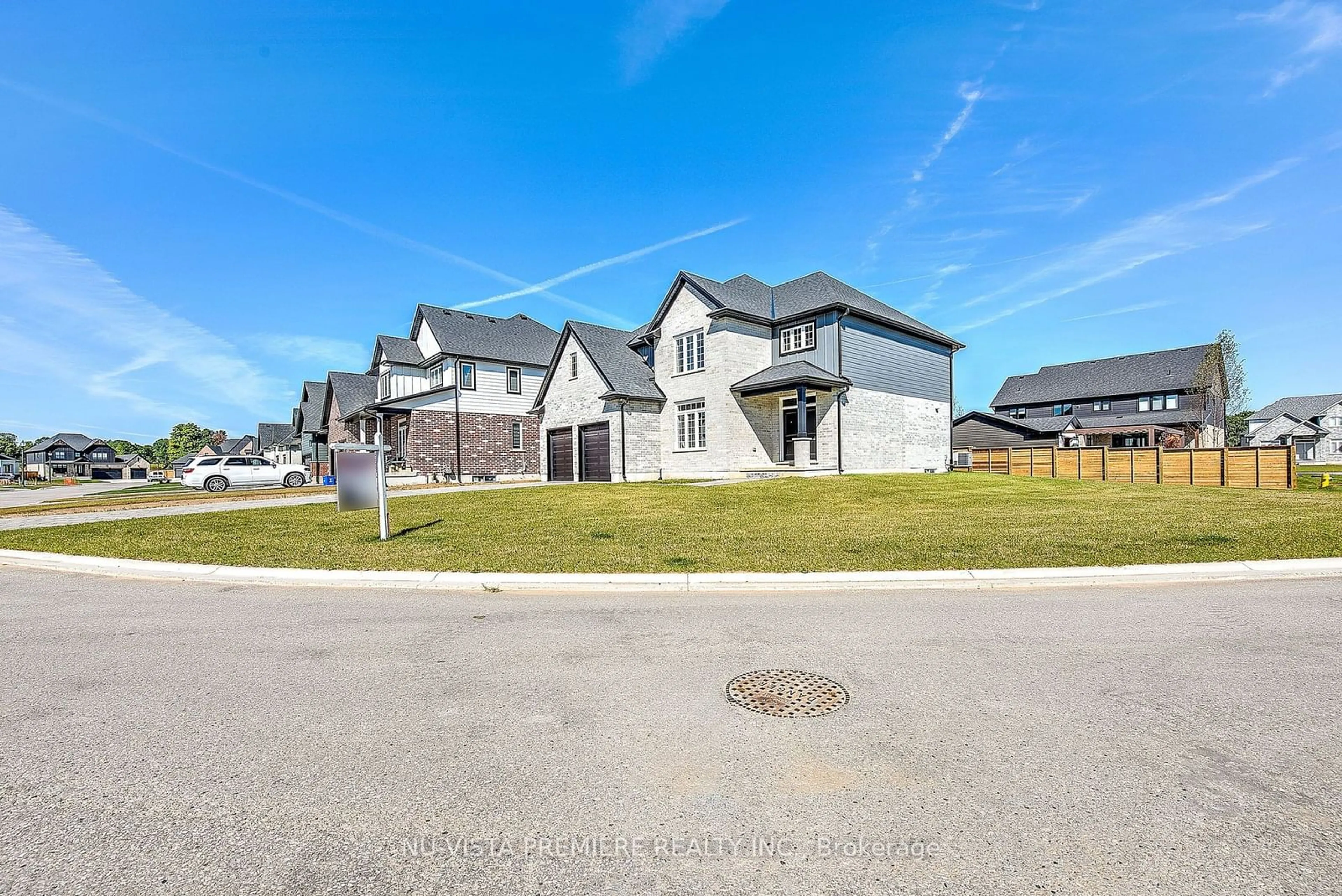 A pic from outside/outdoor area/front of a property/back of a property/a pic from drone, street for 21 Greenbrier Rdge, Thames Centre Ontario N0L 1G3