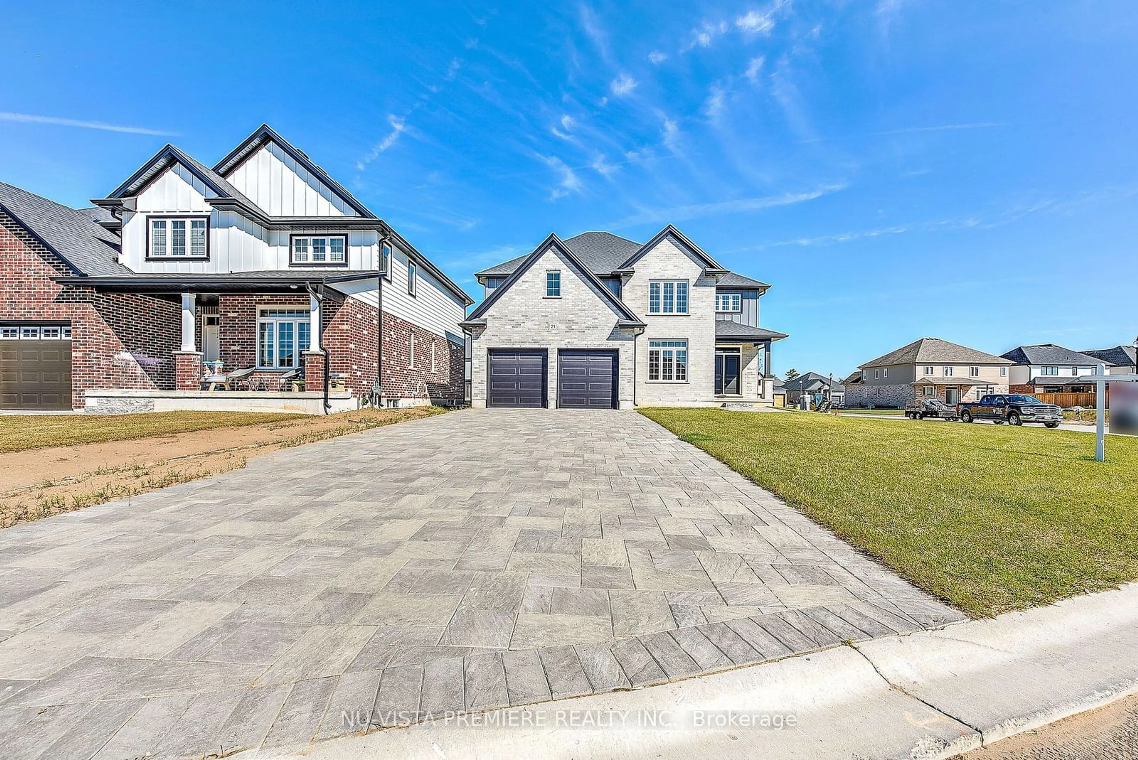 Home with brick exterior material, street for 21 Greenbrier Rdge, Thames Centre Ontario N0L 1G3