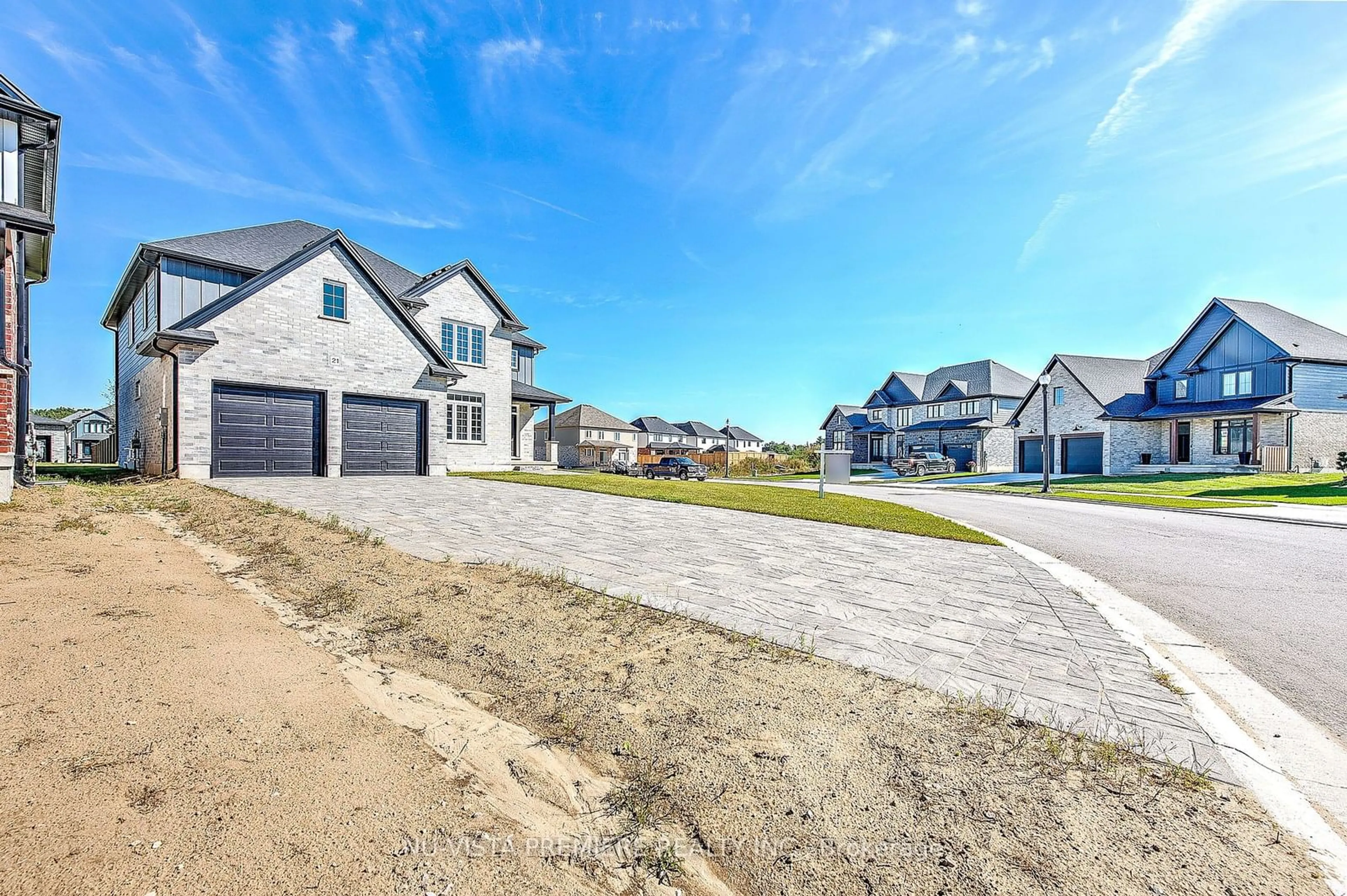 A pic from outside/outdoor area/front of a property/back of a property/a pic from drone, street for 21 Greenbrier Rdge, Thames Centre Ontario N0L 1G3