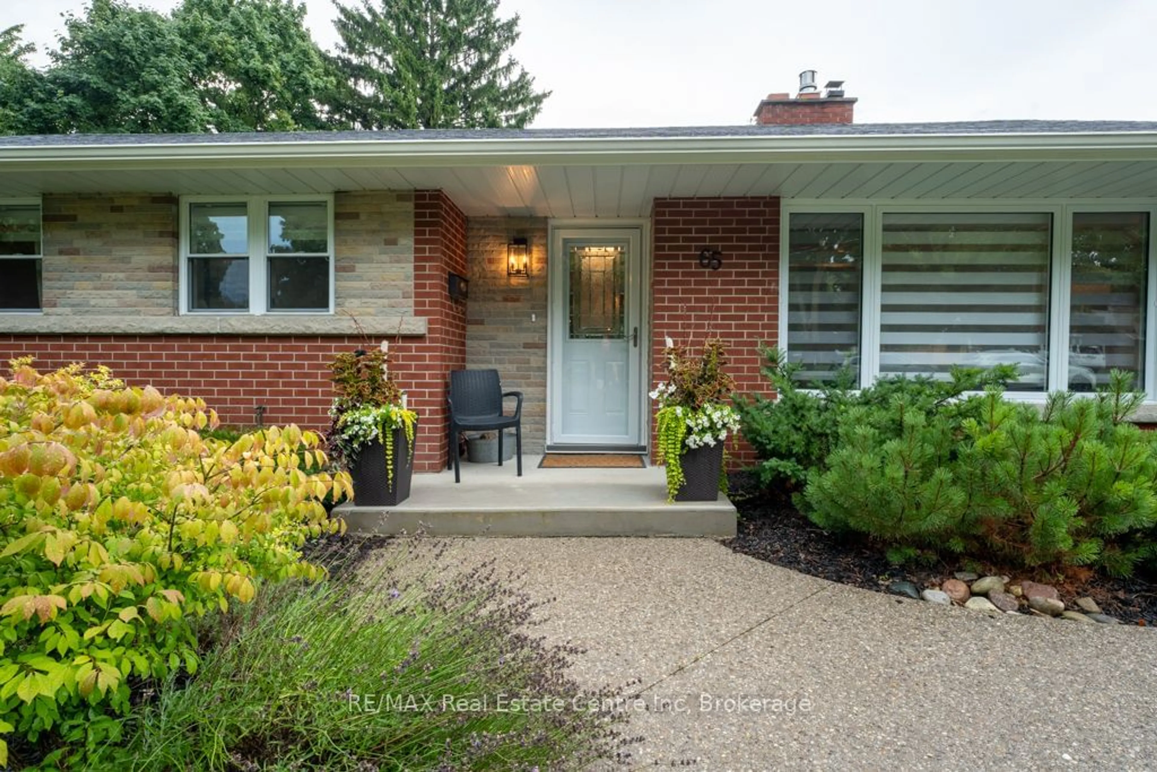 Home with brick exterior material, street for 65 KENSINGTON St, Guelph Ontario N1E 3P6