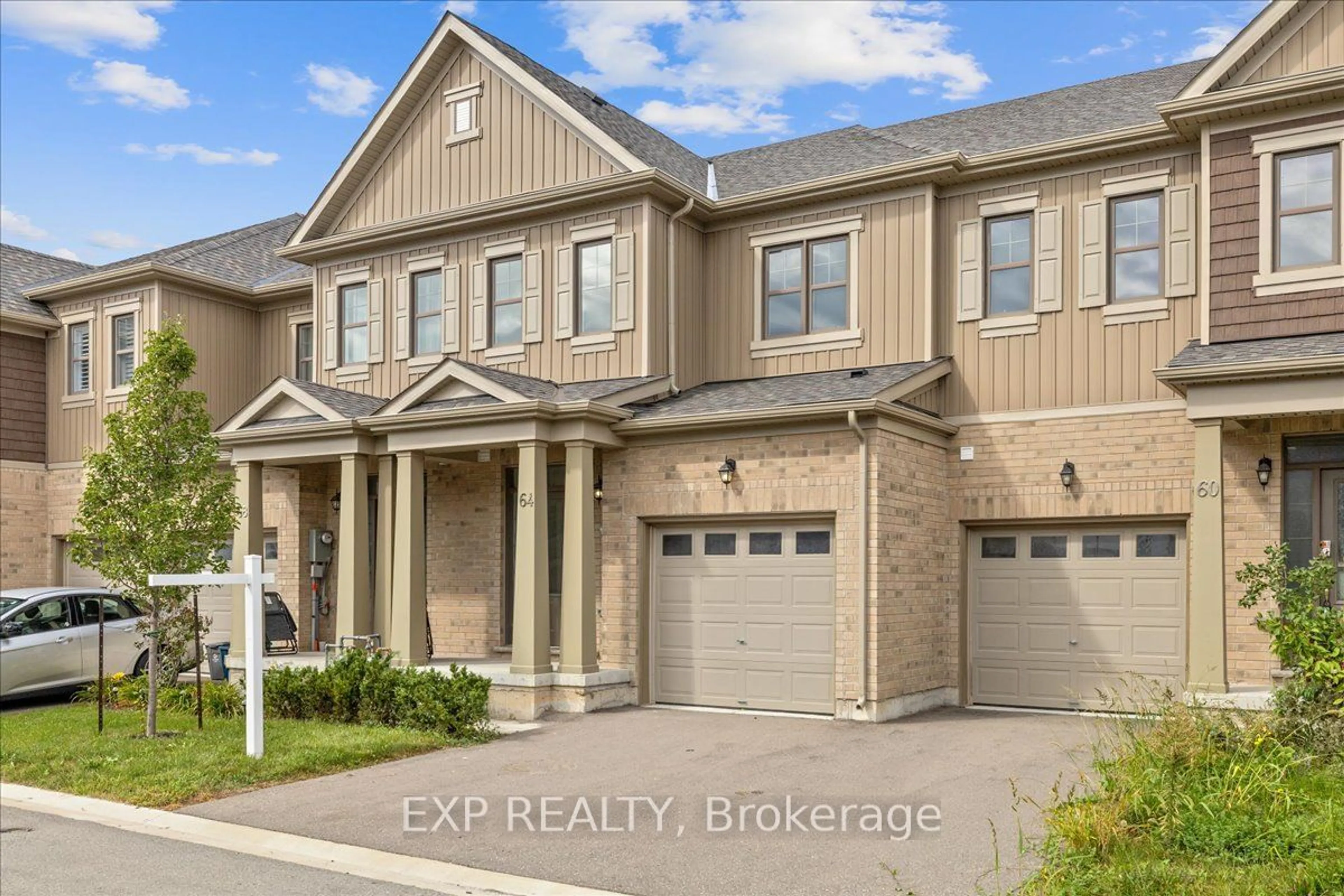 Home with brick exterior material, street for 64 Cosmopolitan Common, St. Catharines Ontario L2M 0B8