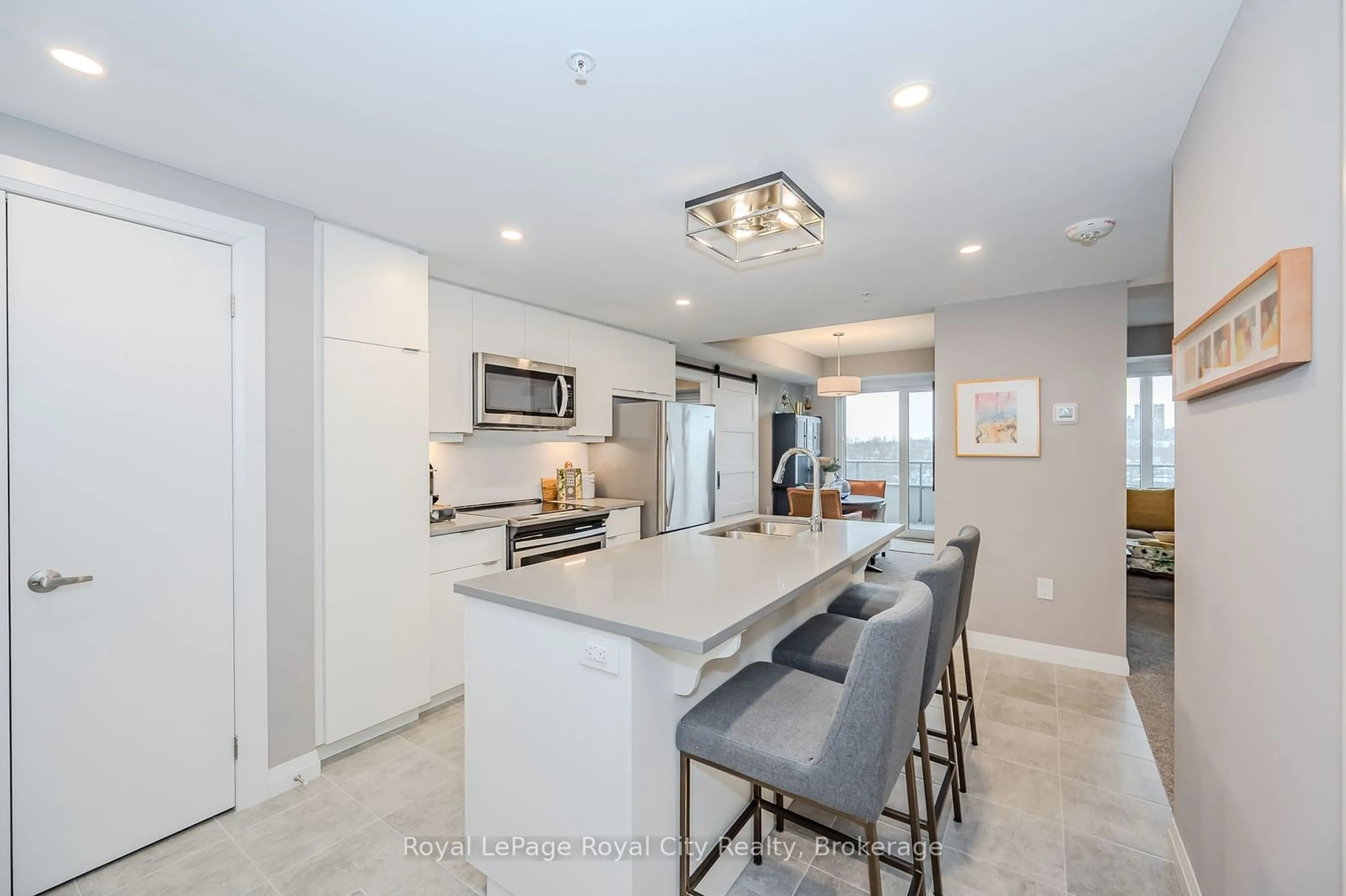 Open concept kitchen, ceramic/tile floor for 73 Arthur St #610, Guelph Ontario N1E 0S6