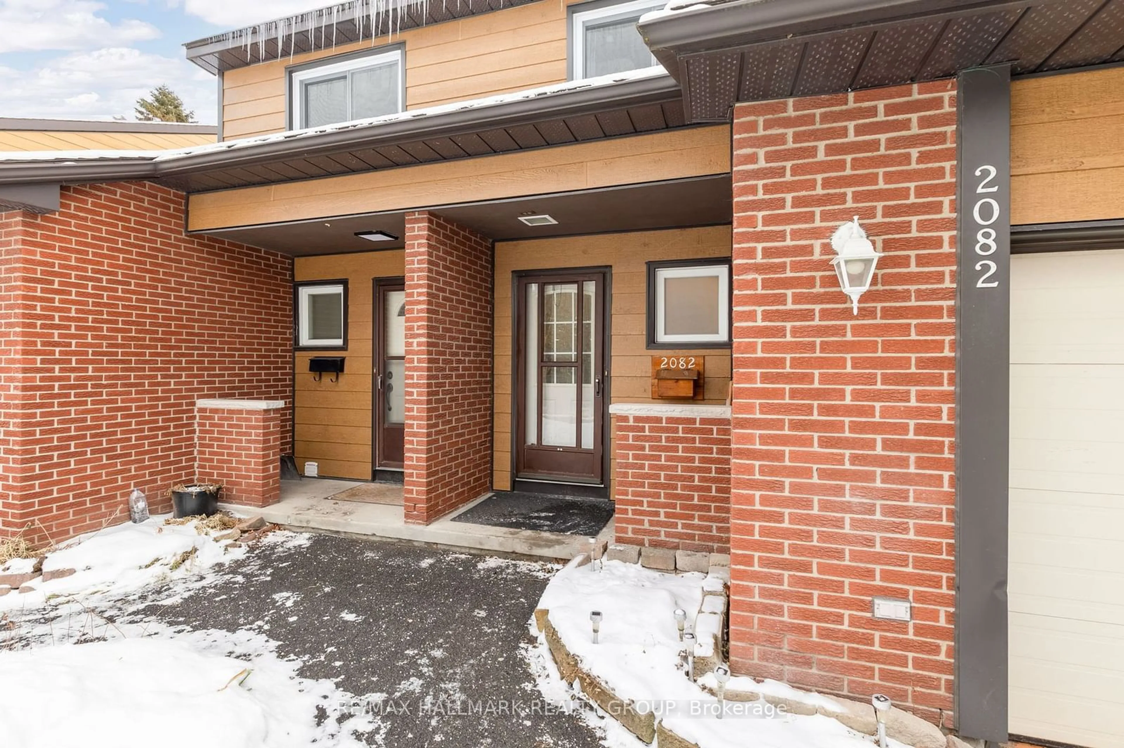 Home with brick exterior material, street for 2082 Orient Park Dr #54, Blackburn Hamlet Ontario K1B 4V9