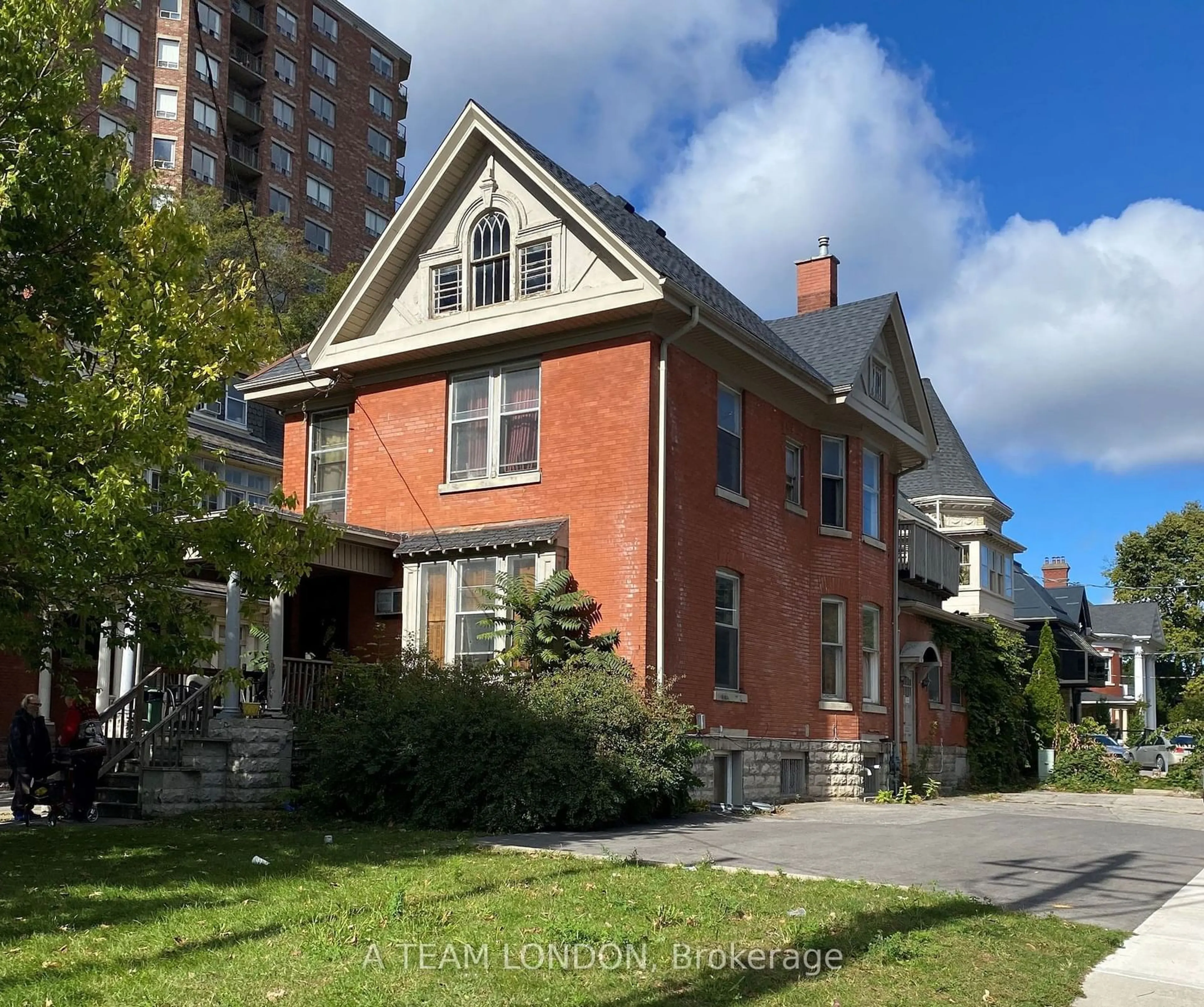 Home with brick exterior material, street for 334 Queens Ave, London Ontario N6B 1X4