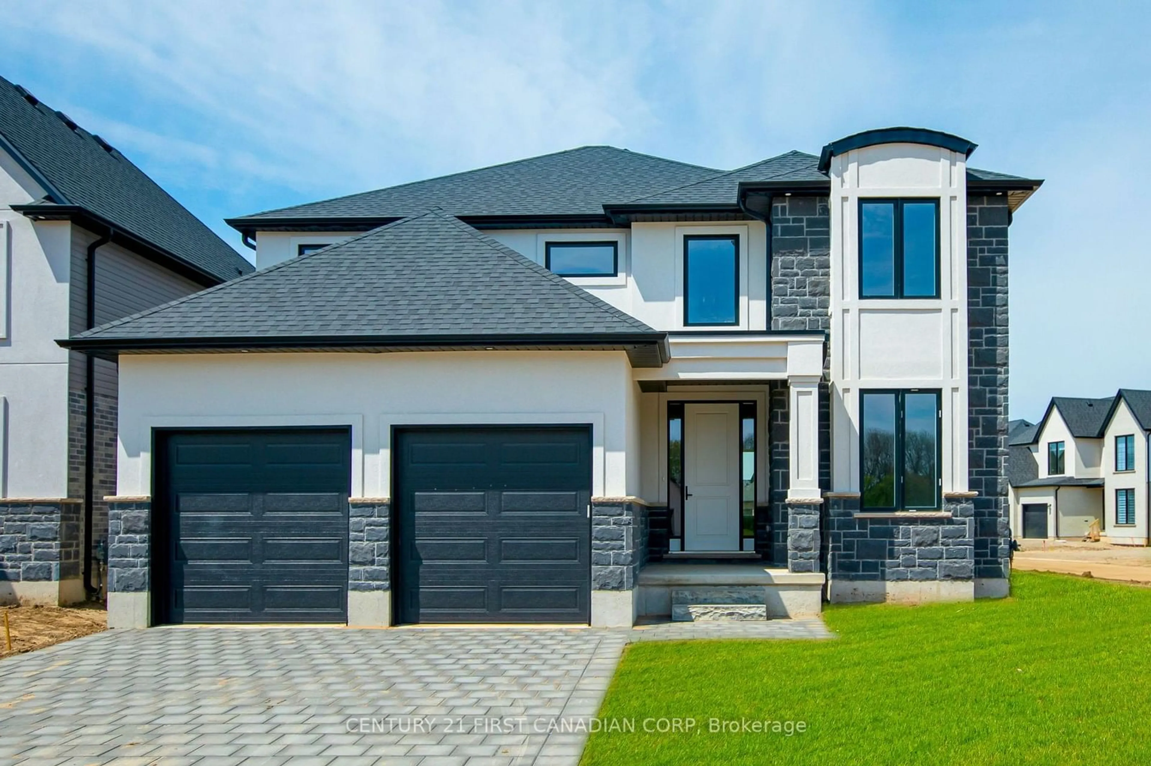 Home with vinyl exterior material, street for 100 ASPEN Circ, Thames Centre Ontario N0M 2P0