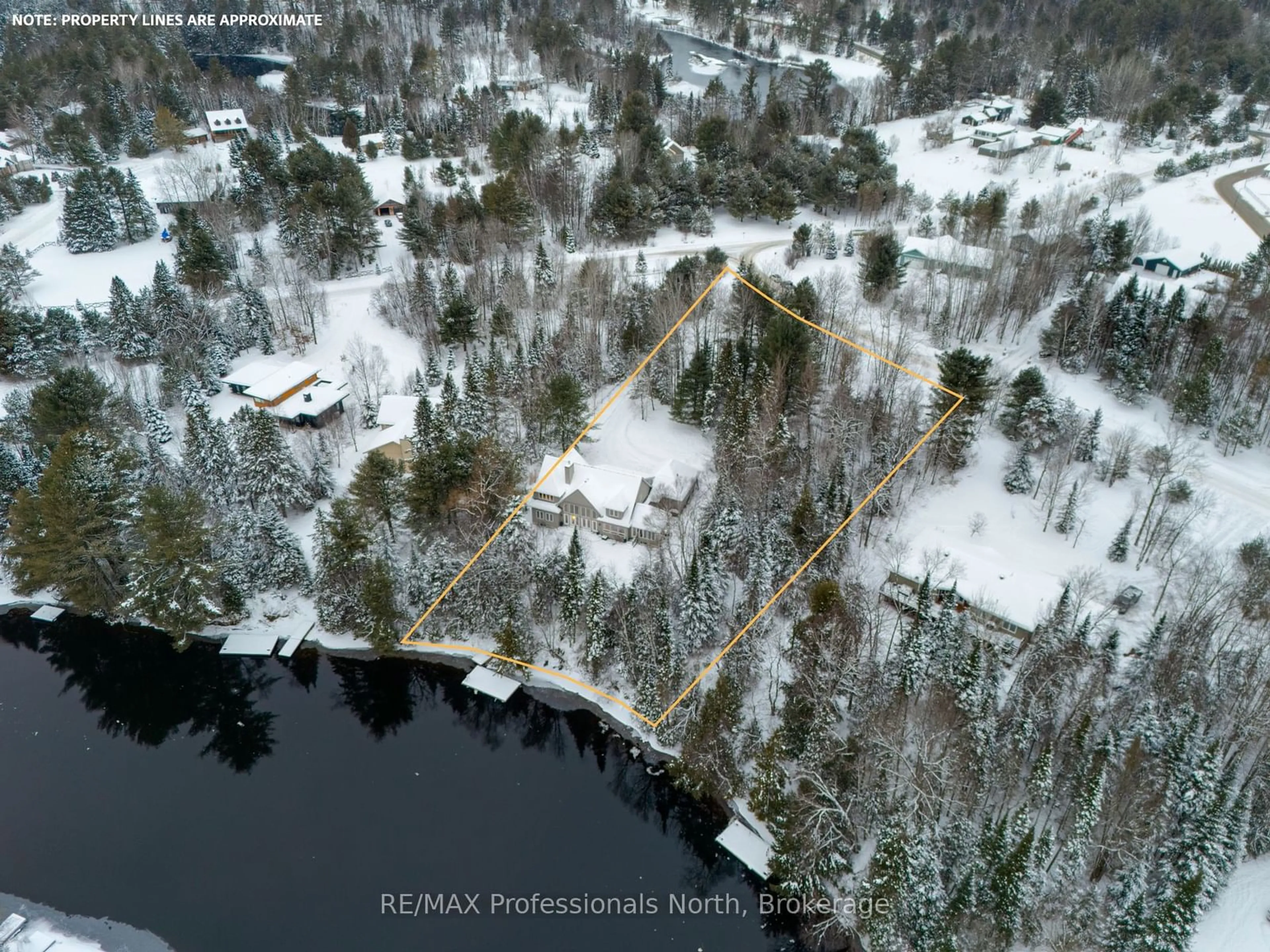 A pic from outside/outdoor area/front of a property/back of a property/a pic from drone, water/lake/river/ocean view for 73 Thomas Cres, Huntsville Ontario P1H 2M4